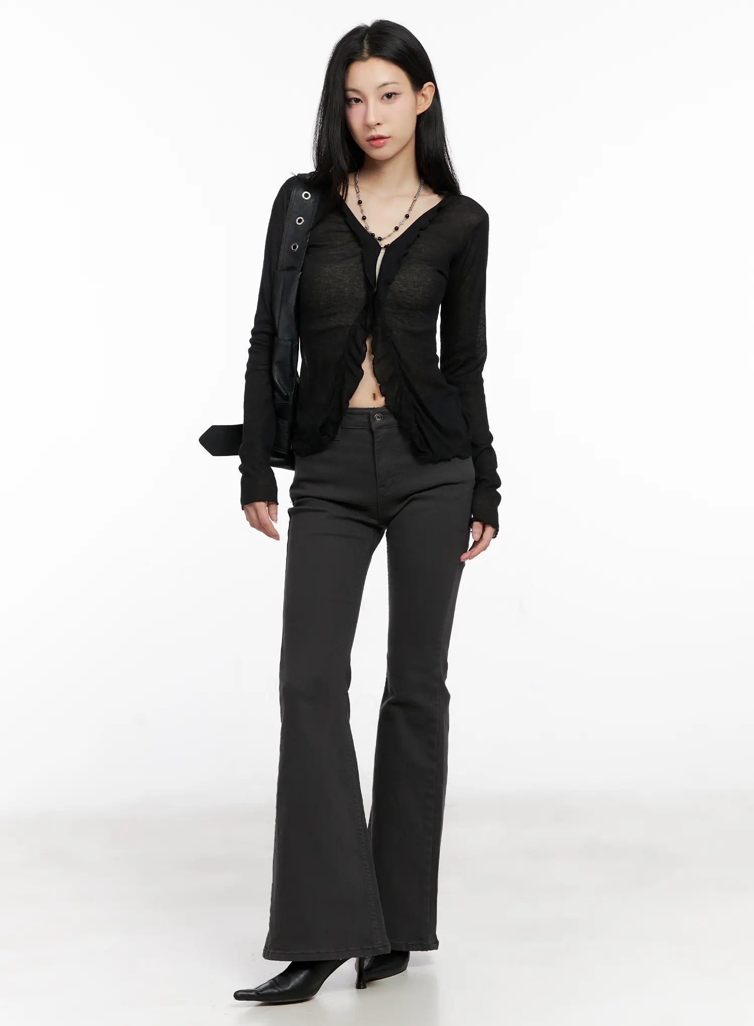 LEWKIN Addie Chic Flared Jeans CG522 in dark gray, full-length front view on model, slim bootcut silhouette, cotton-spandex blend, styled with sheer black cardigan and heels.