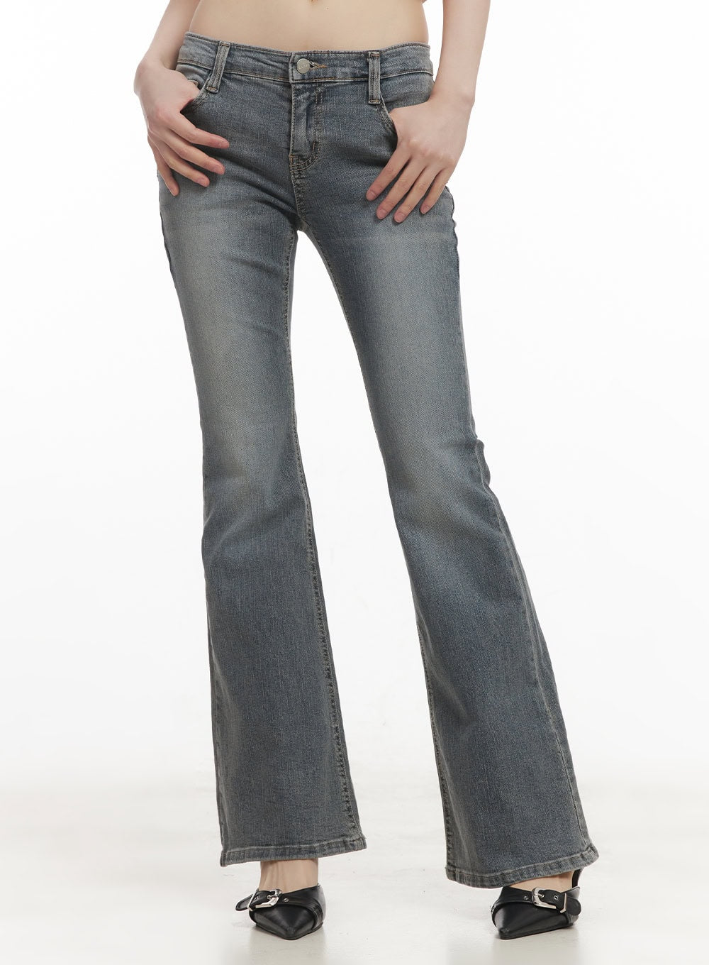 LEWKIN Rachel Washed Bootcut Jeans with Hip Pads CF518 in gray, front view on model, low-waist slim fit washed denim with bootcut flare, paired with black buckle mules.