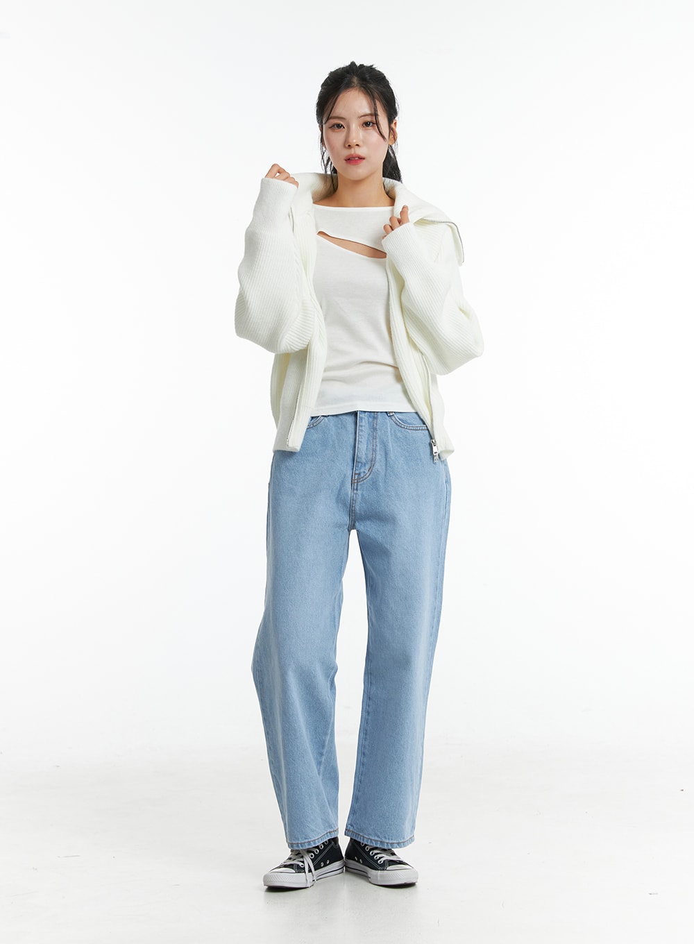 LEWKIN Light Washed Straight Jeans ON329 in light blue, full-body front shot on model, straight-fit cotton denim, styled with white knit cardigan and black canvas sneakers.