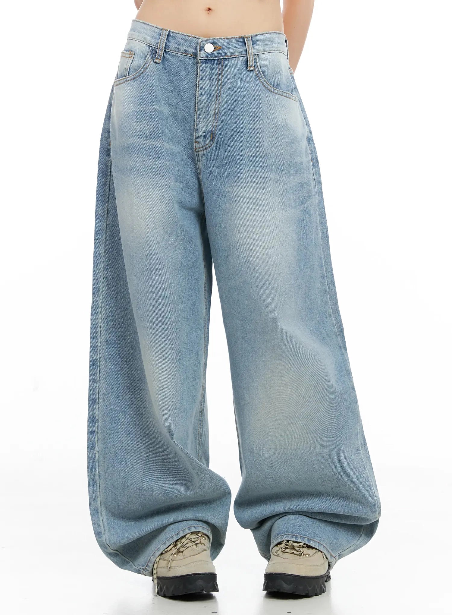 LEWKIN Dain Washed Wide-Leg Jeans IL531 in light blue, front crop view on model, ultra-wide cotton denim with washed fade, pooling hem over chunky sneakers.