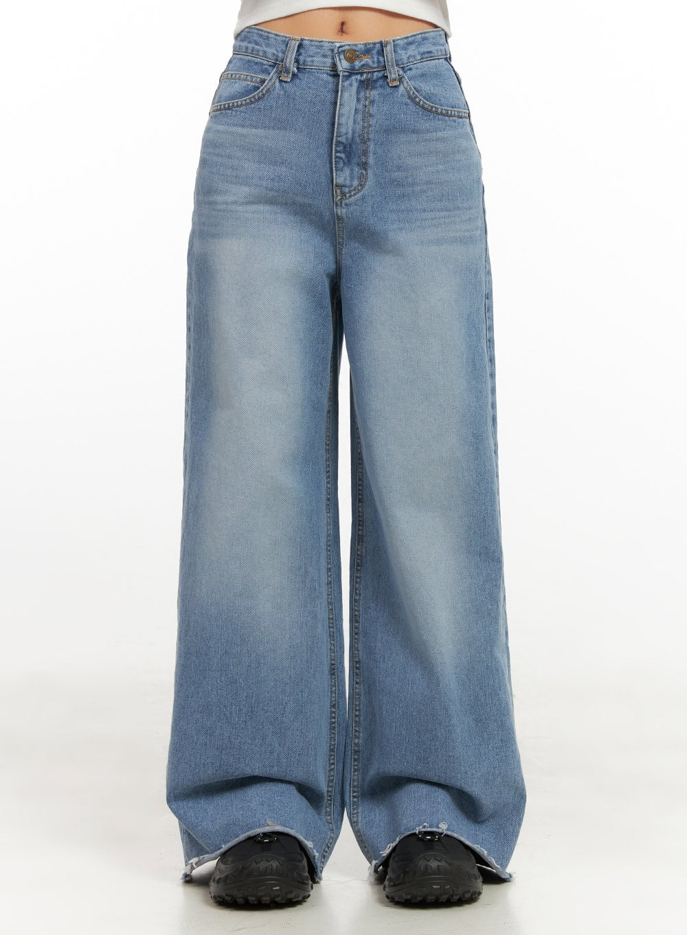 LEWKIN Melody Chic Flare Wide Leg Jeans CN428 in light blue, front product shot from waist down, wide-fit washed cotton denim with flare hem and raw destroyed hem edge, styled with black chunky sneakers.