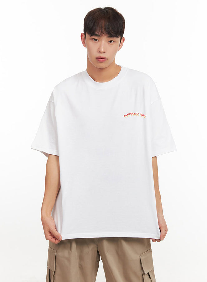 LEWKIN Men's Logo Oversized T-Shirt IF517 in white, front view on model, drop-shoulder cotton tee with orange gradient chest logo, paired with beige cargo pants.