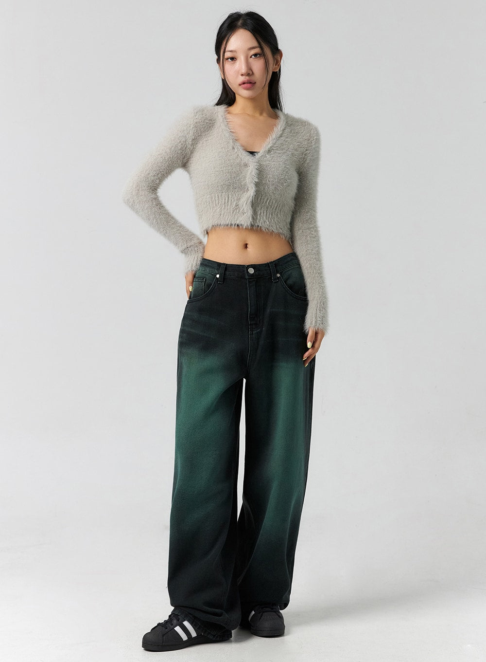 LEWKIN Comfy Wide Leg Color Jeans CS305 in dark green, full-length front shot on model, wide-fit cotton denim with faded wash, paired with grey fuzzy crop cardigan and black sneakers.