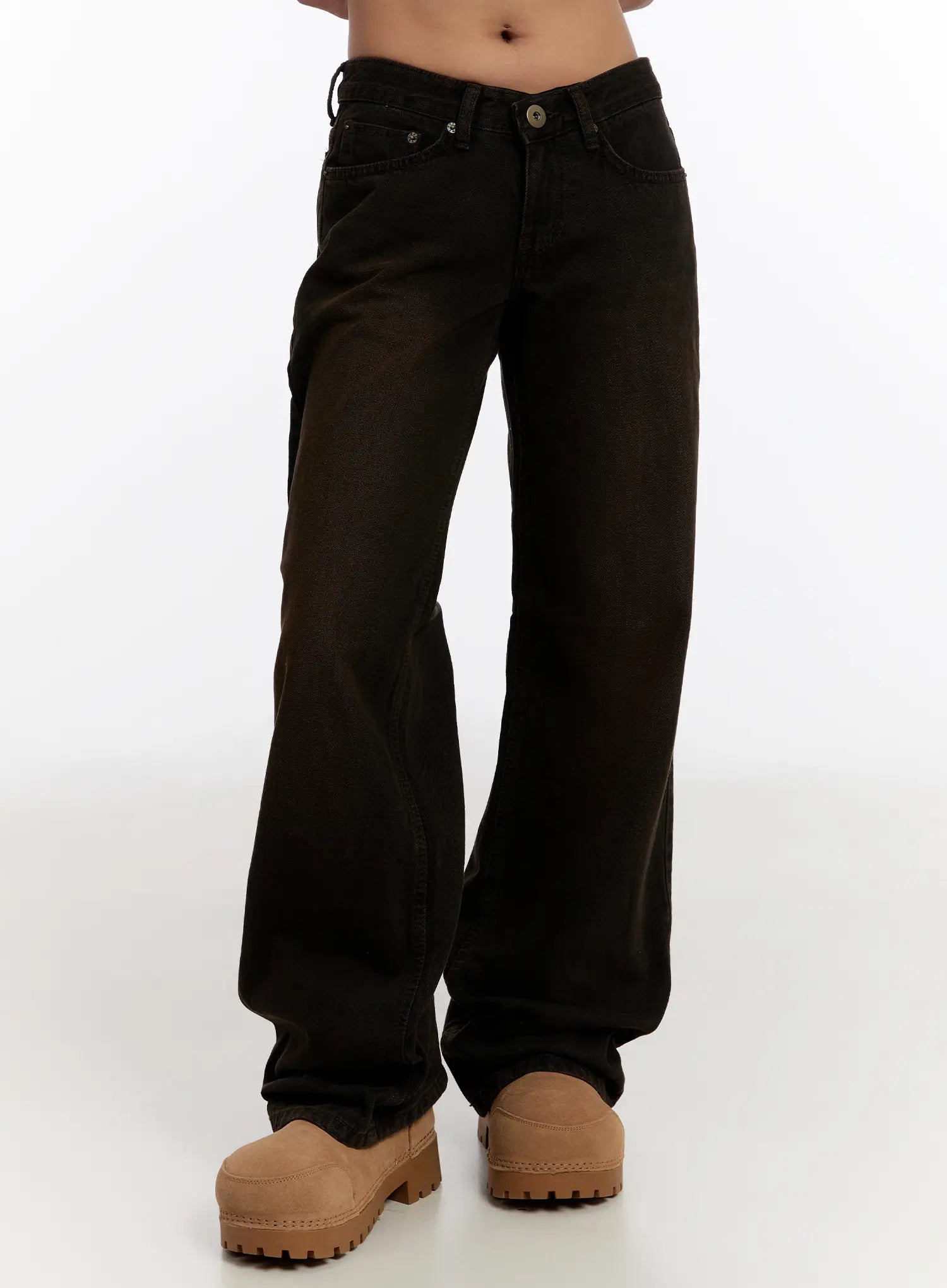 LEWKIN Mael Low Rise Straight Jeans CN527 in black, front crop shot on model, low-rise waistband with V-notch, straight-leg cotton denim, paired with tan chunky clogs.