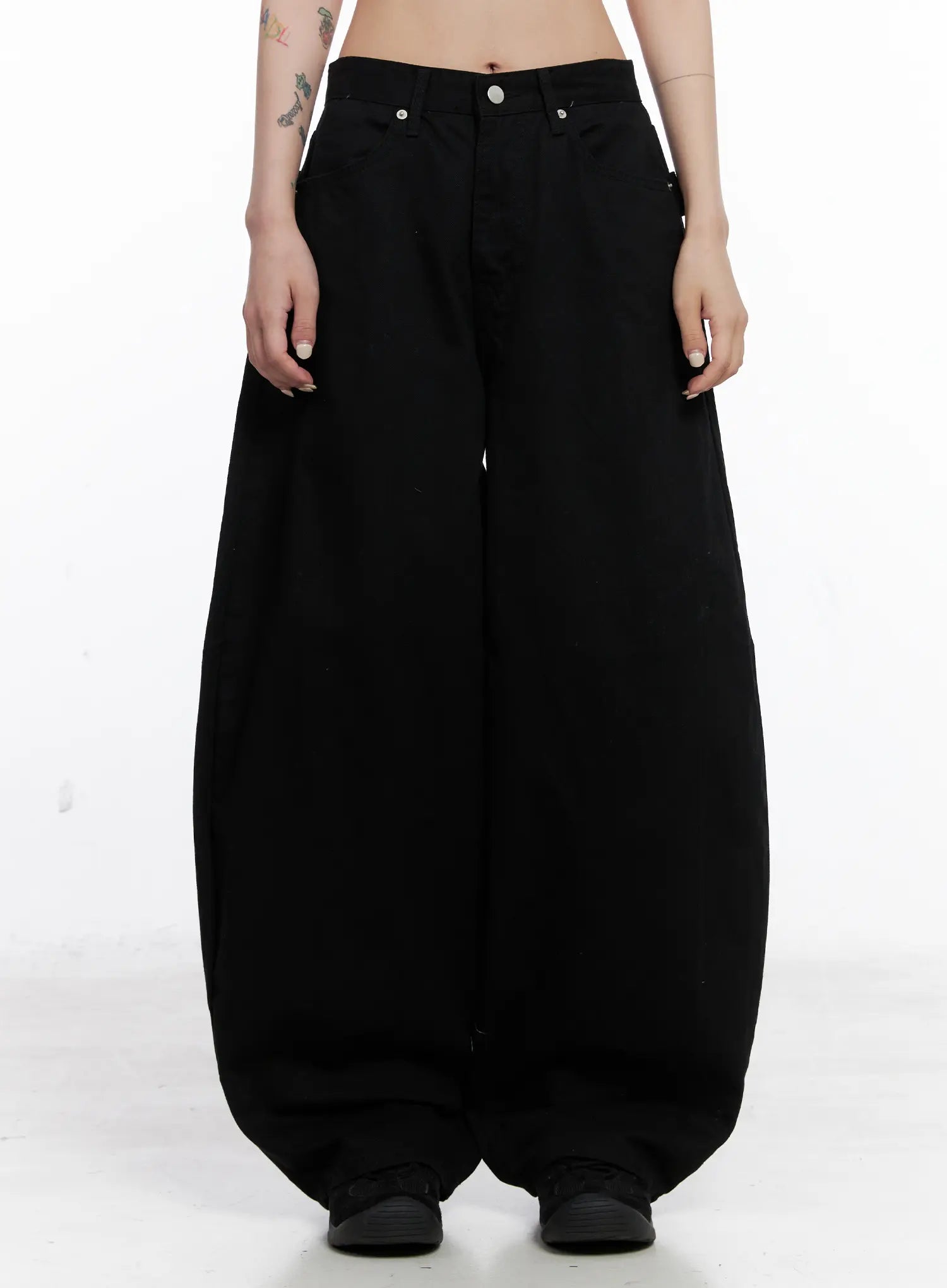 LEWKIN Nana Studded Belt Balloon Jeans CS512 in black, front view on model, wide-fit balloon silhouette in cotton, low rise waistband, dramatic volume at thighs pooling at hem.