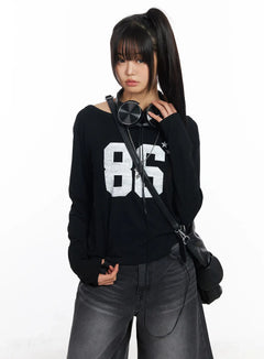 loose-fit-boat-neck-graphic-long-sleeve-tee-cf504 / Black