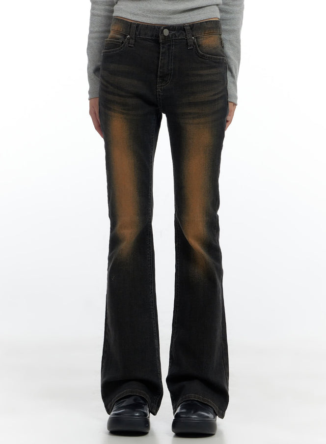 LEWKIN Harley Slim Washed Denim Bootcut Jeans CS420 in Blue, front cropped view on model, slim fit with amber-washed fading, low-rise waist, bootcut flare hem, paired with black shoes.