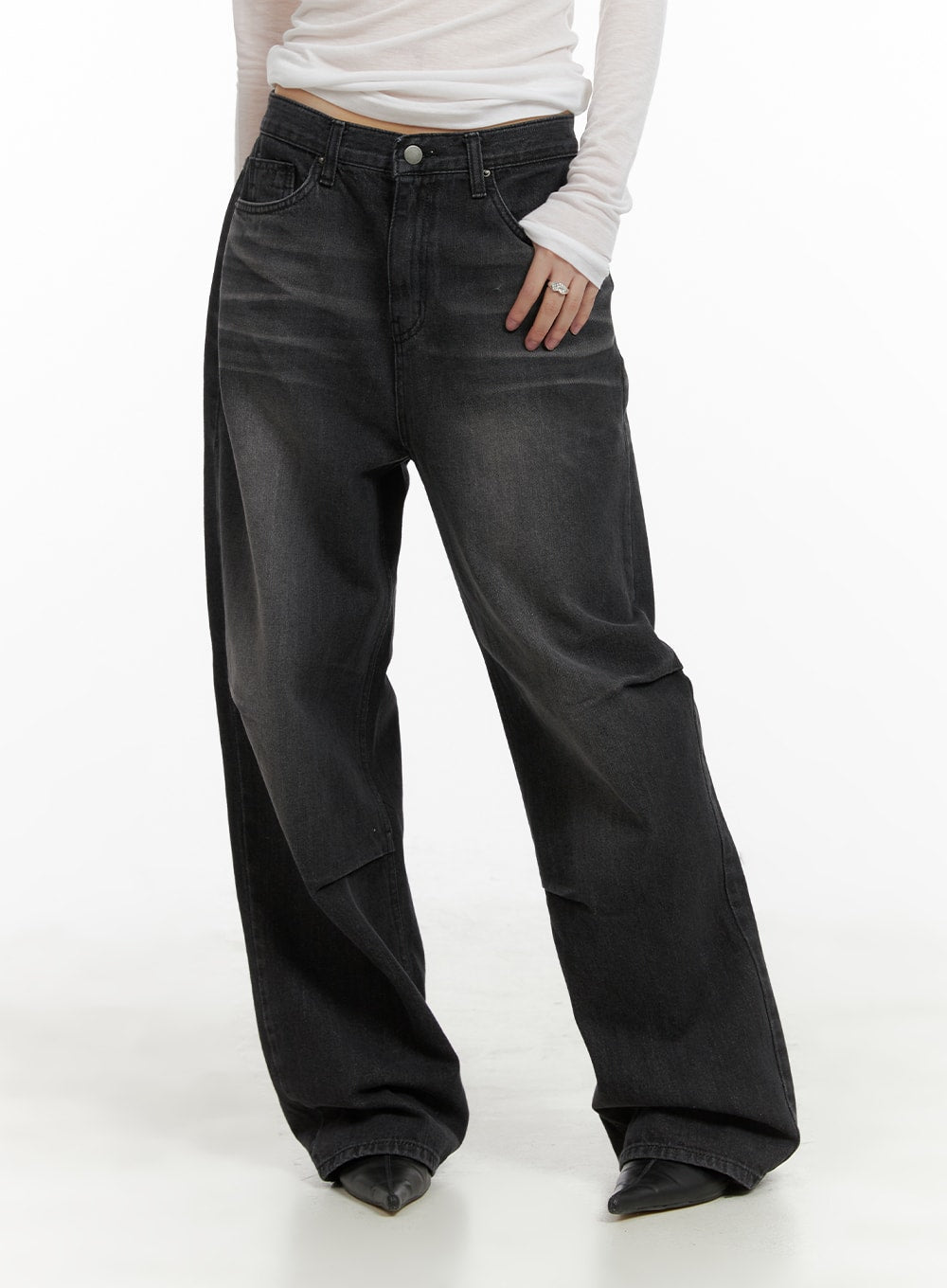LEWKIN Pintuck Washed Denim Wide Leg Jeans CA419 in black, front three-quarter crop on model, wide-fit washed cotton denim with pintuck seams, paired with white long-sleeve top and black boots.