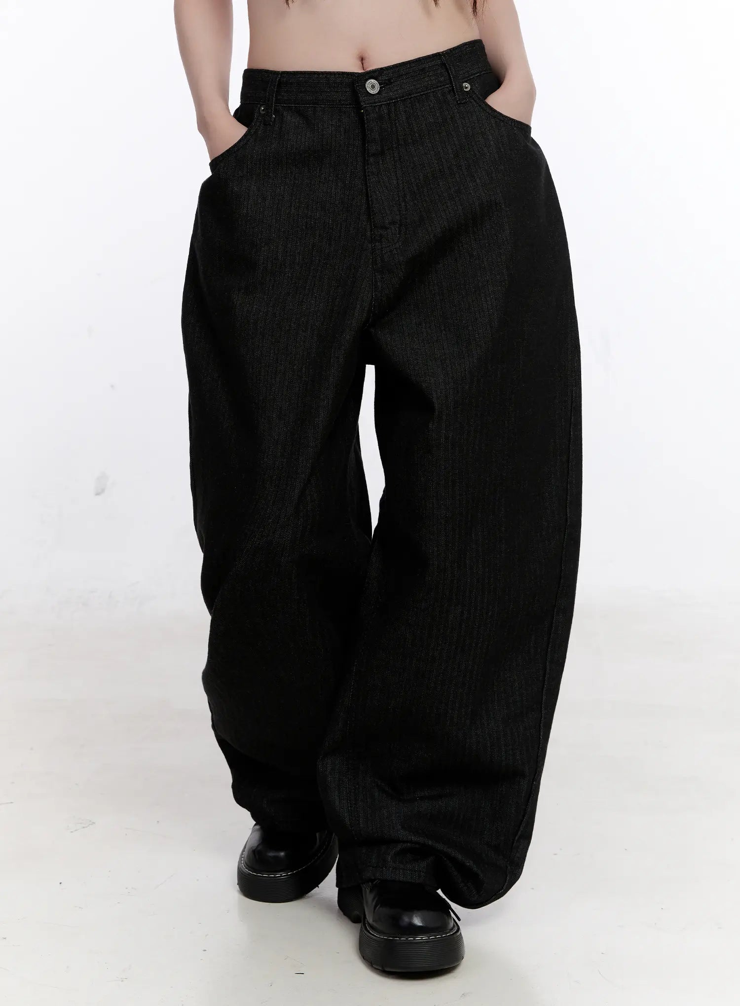 LEWKIN Vada Stitched Wide Leg Jeans CS530 in Black, front waist-to-hem shot on model, oversized cotton denim with wide balloon silhouette and side pockets, paired with black chunky loafers.