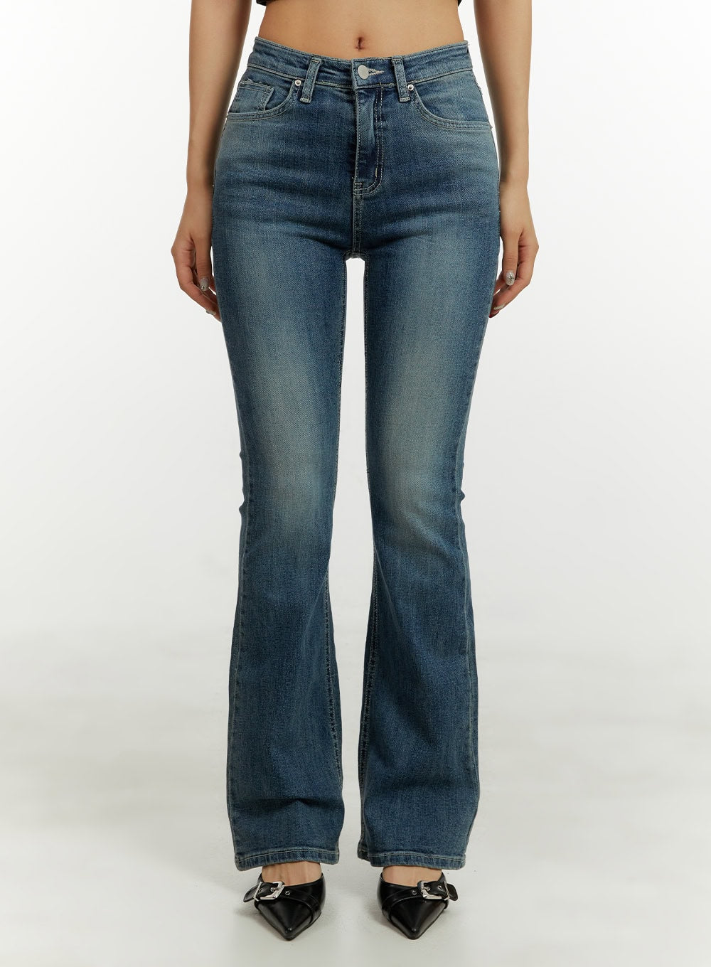 LEWKIN Low Rise Bootcut Jeans CY409 in blue, front view on model, slim-fit washed denim with low waist, five-pocket styling, paired with black heels.
