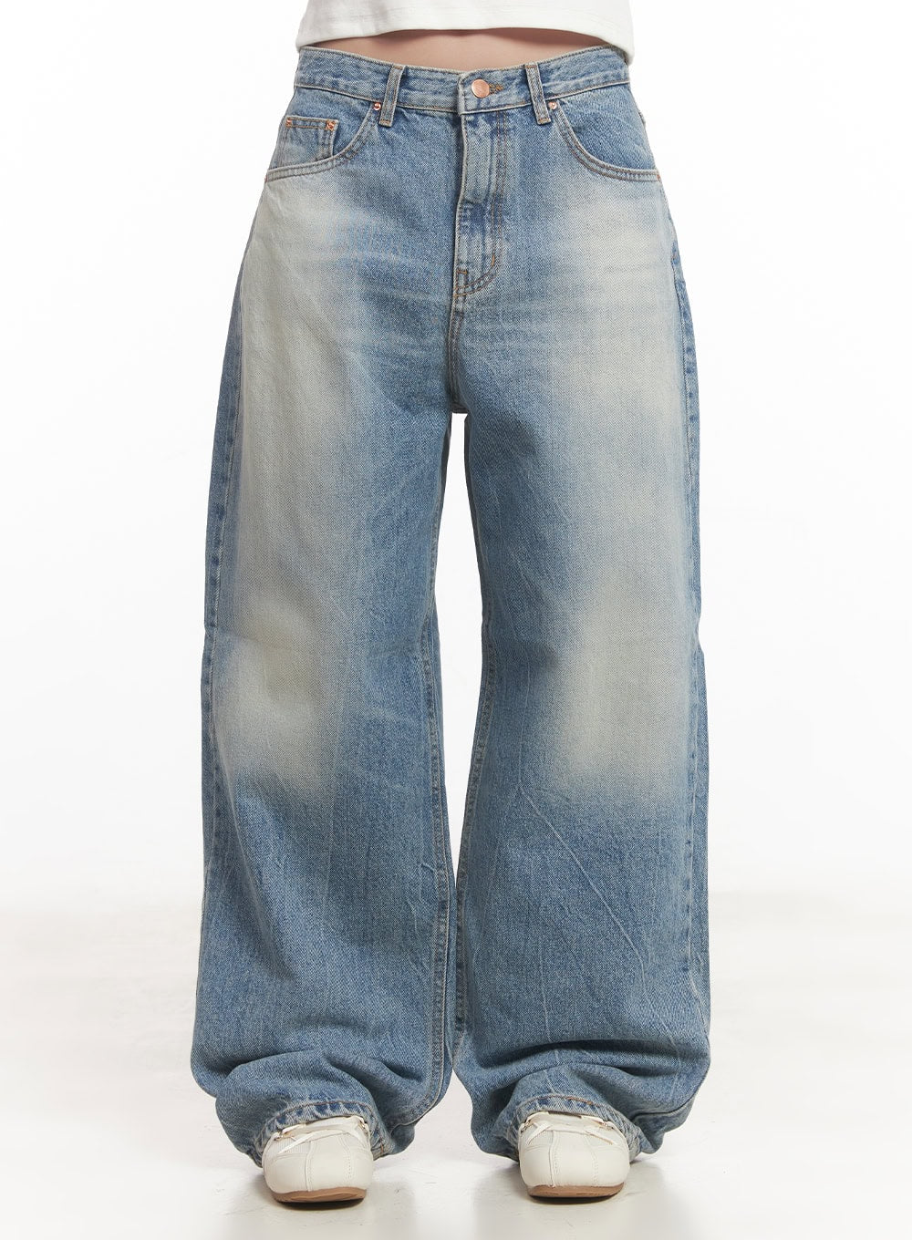LEWKIN Lumira Back-Detail Washed Wide Leg Jeans CA530 in blue, front waist-down shot on model, wide-fit washed cotton denim with faded finish, pooling at white sneakers.