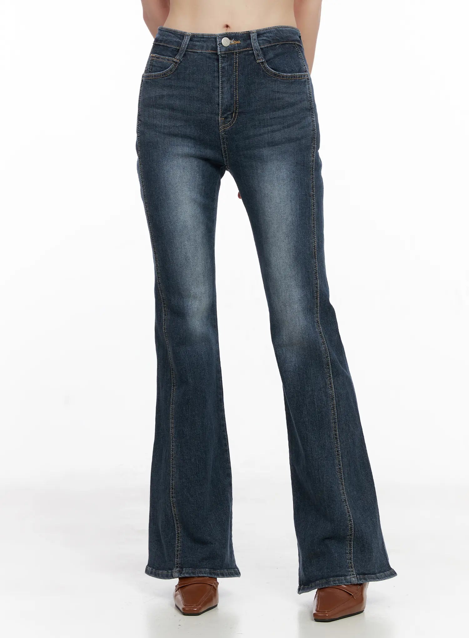 LEWKIN Giana High Waist Hip Pad Flare Jeans CG519 in blue, front view on model, slim-fit high-waist washed denim with flare hem, paired with brown heeled mules.