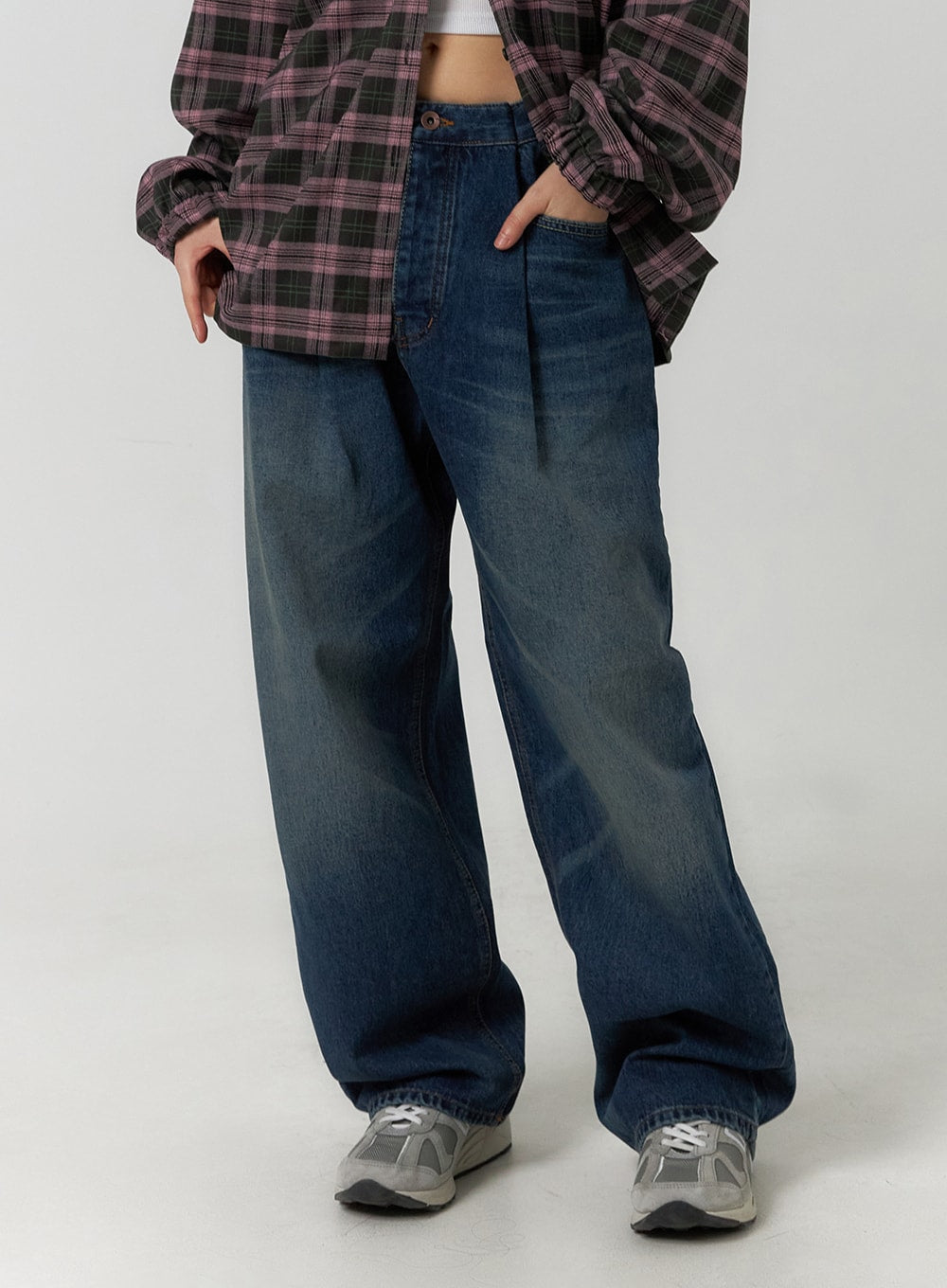 LEWKIN Wide Leg Washed Denim Jeans CF407 in blue, front close-up on model, wide-fit cotton denim with pleated waist and washed fading, paired with plaid shirt and sneakers.