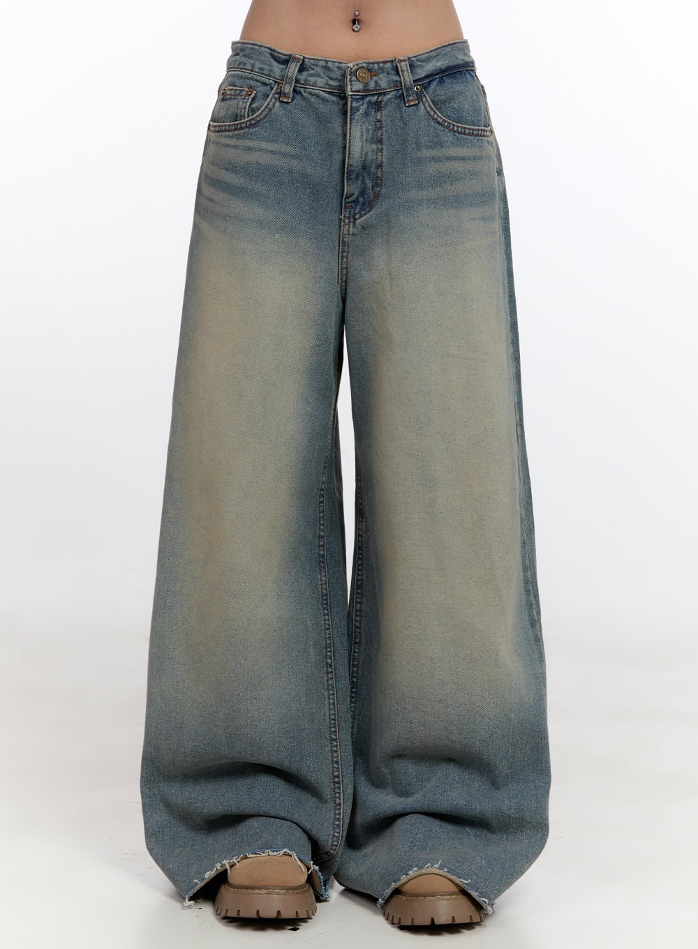 LEWKIN Felicia Cotton Wide Fit Baggy Jeans CN425 in blue, front waist-to-hem product shot, washed cotton denim, ultra-wide baggy leg, low rise, frayed raw hem, worn with chunky beige sandals.