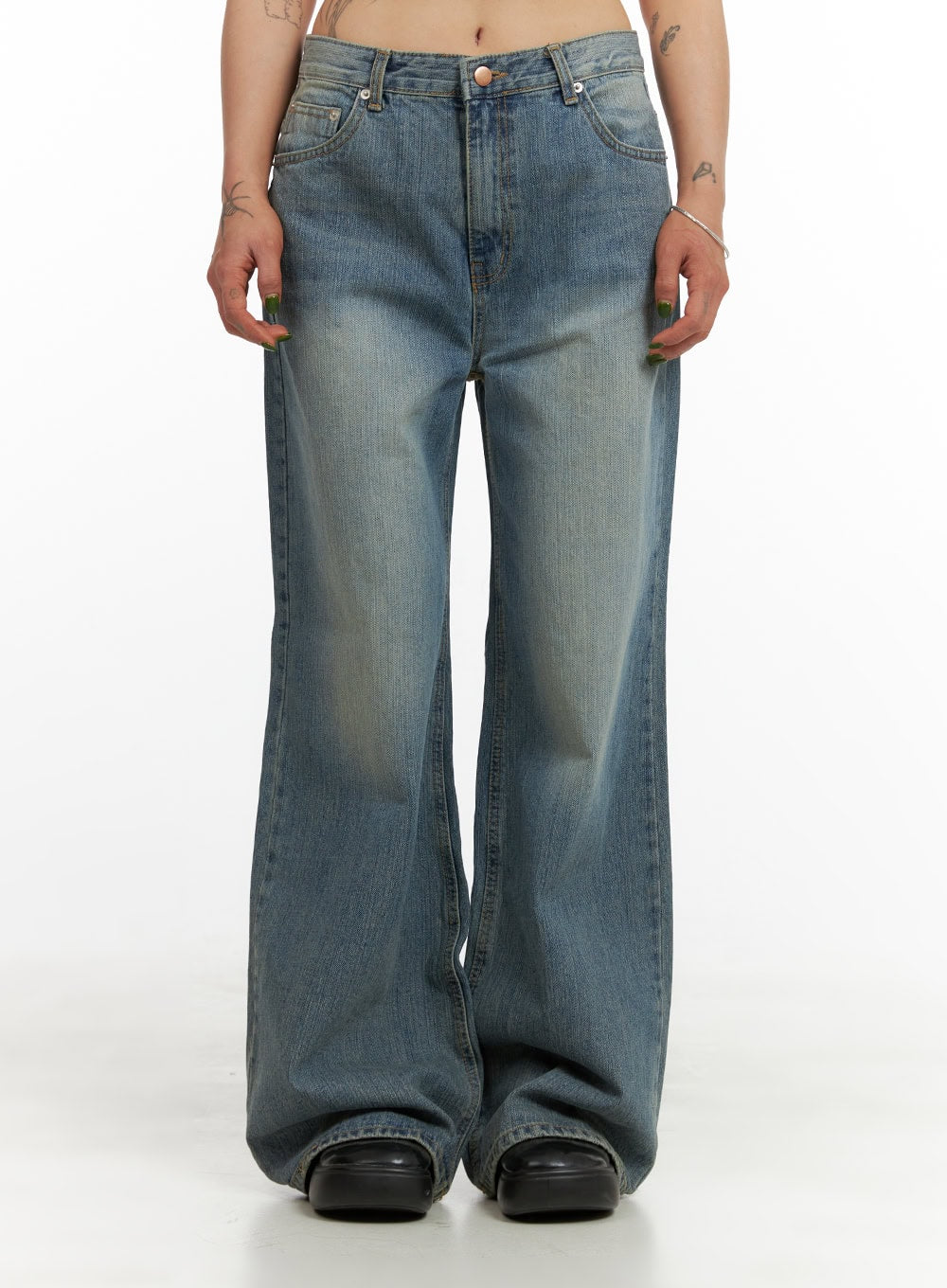 LEWKIN Wide Washed Denim Jeans CY429 in blue, front crop view on model, wide-leg cotton denim with washed fading, mid-rise waist, five-pocket styling, pooling at hem over black shoes.