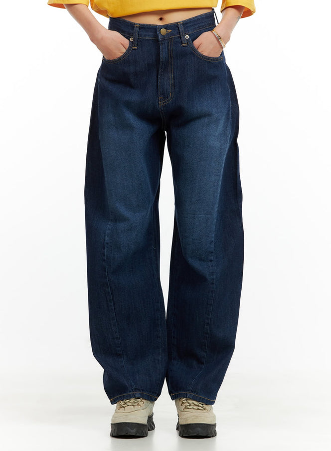 LEWKIN Low Rise Loose fit Baggy Jeans CU417 in blue, front view on model, wide-leg washed cotton denim, low rise with brass button, paired with yellow crop tee and chunky sneakers.