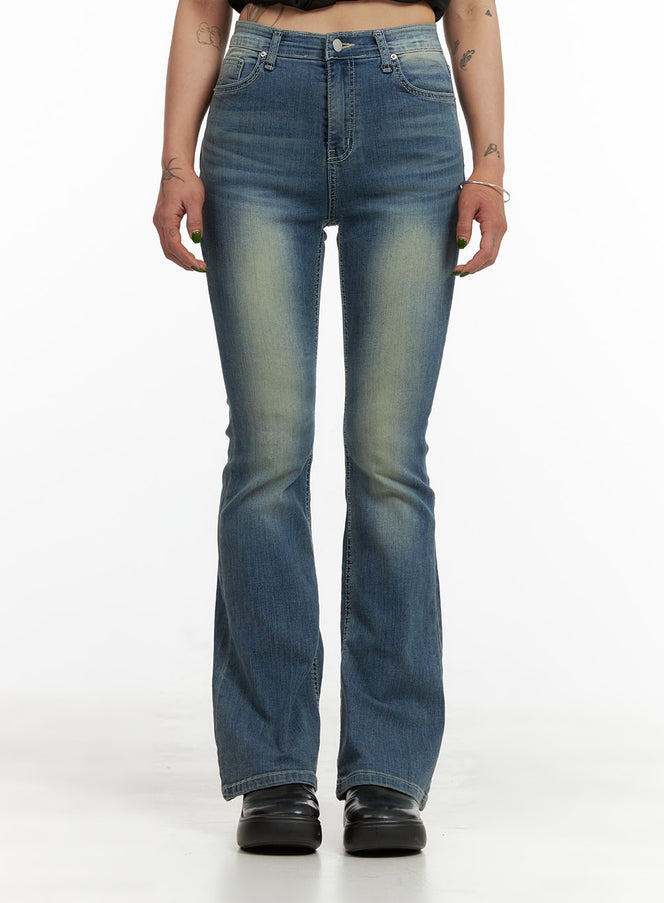 LEWKIN Washed Slim Bootcut Jeans CY429 in blue, front view on model, high-waist slim fit with washed fading, subtle bootcut flare hem, paired with black chunky loafers.