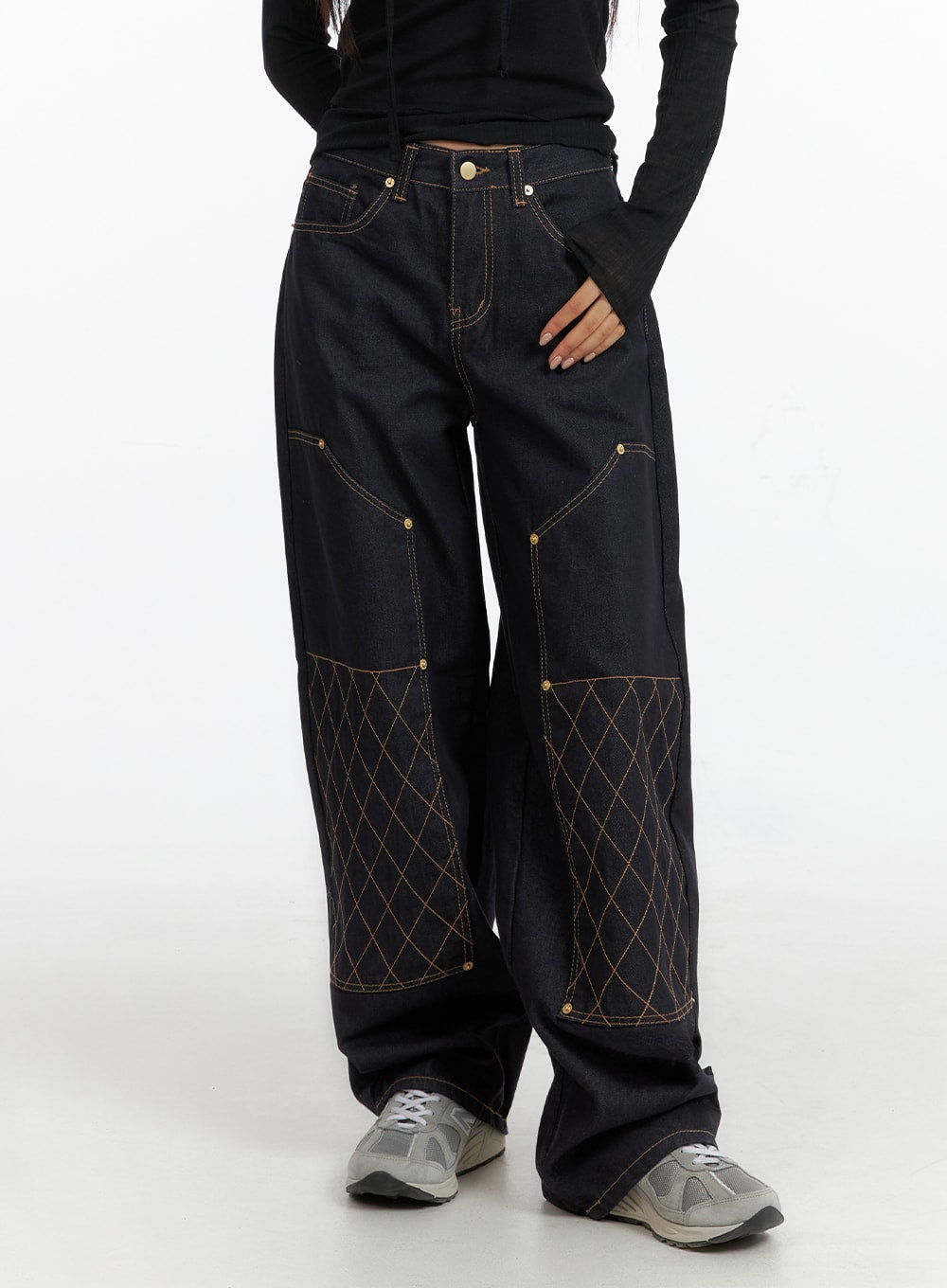 LEWKIN Stitched Wide Denim Jeans CF408 in dark navy, front waist-to-hem shot on model, wide-fit cotton denim with contrast amber stitch and diamond quilt detail at knee, paired with black top.