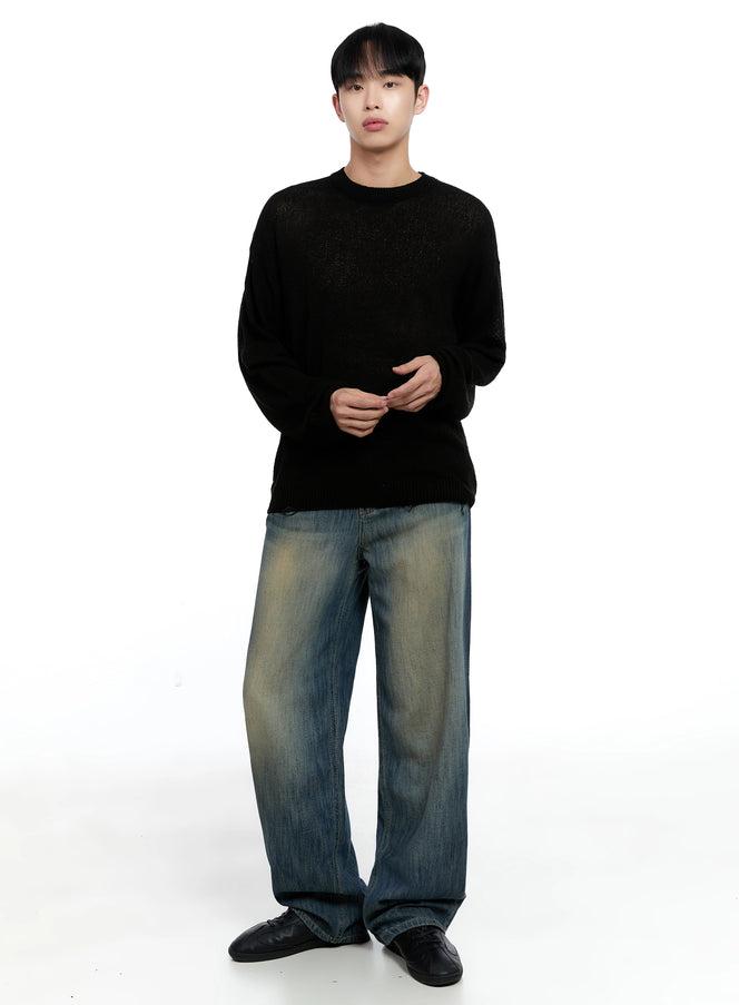 LEWKIN Men's Vintage Wide-Leg Jeans IG520 in washed blue, full-body front on model, vintage-washed wide-leg denim with yellow tint, paired with black knit sweater and loafers.