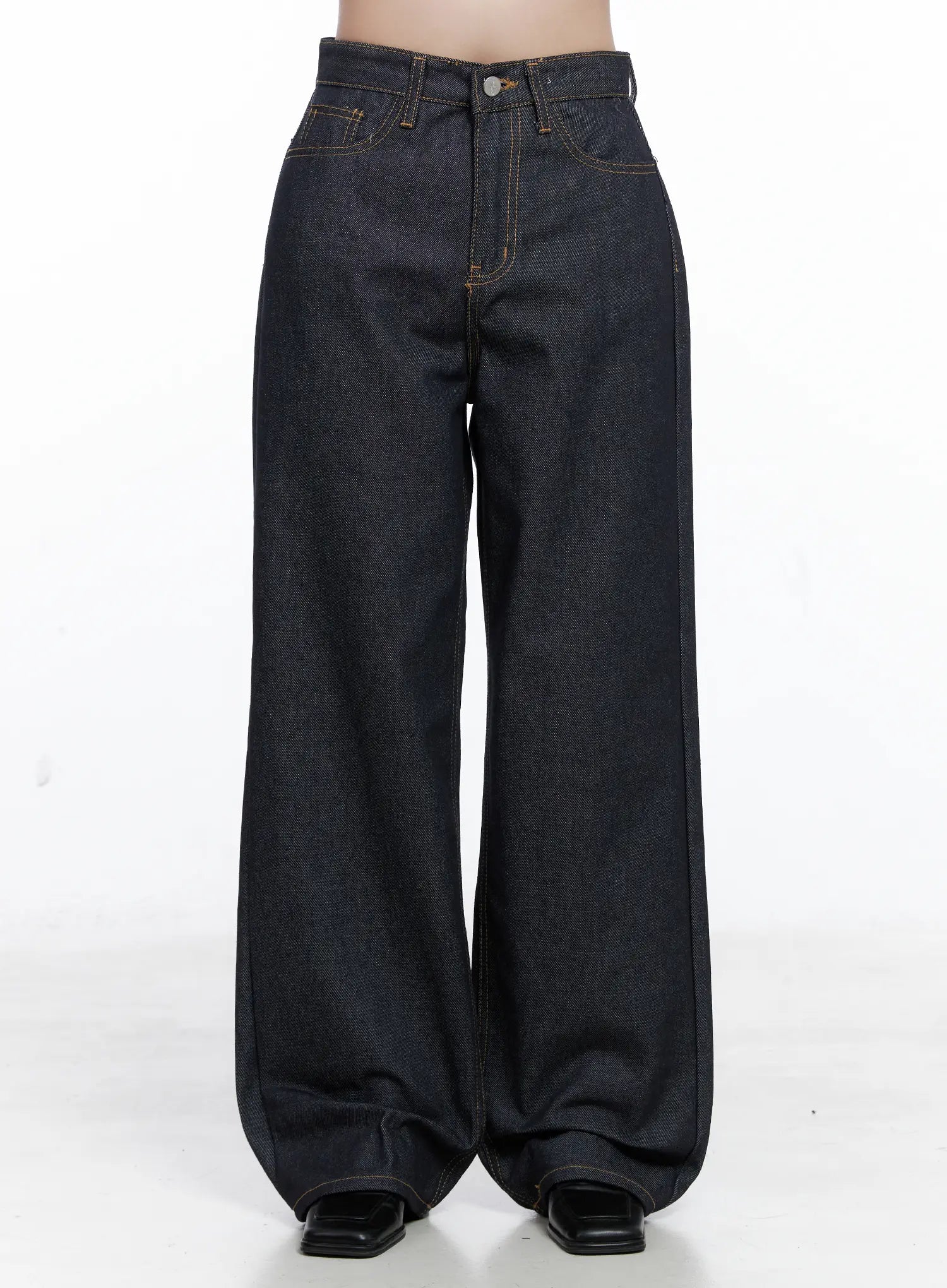 LEWKIN Reyna Non-Fade Relaxed Jeans CS519 in dark blue, front product shot on model, high-waist wide-leg cotton denim with contrast gold stitching and front pockets, paired with black loafers.