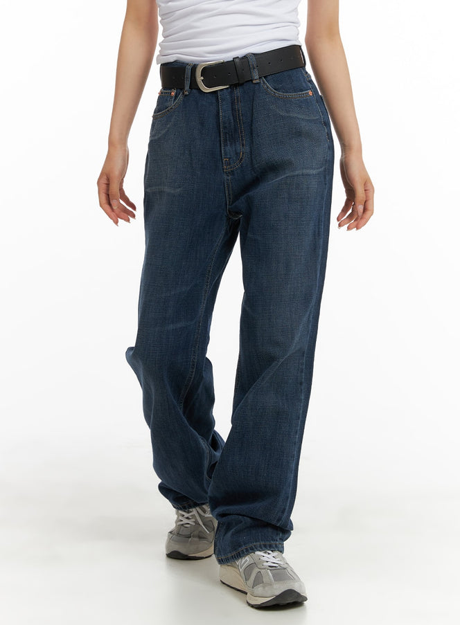 LEWKIN Washed Straight Jeans CA408 in dark blue, front cropped view on model, washed cotton denim straight fit, high waist with black belt, styled with white tee and grey sneakers.