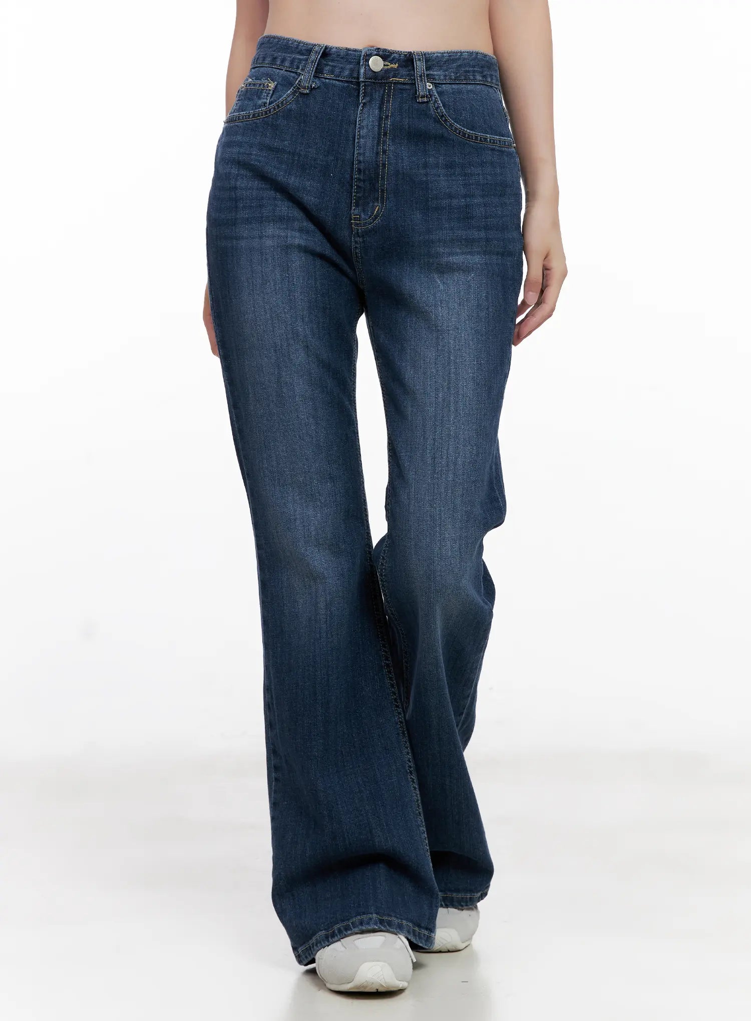 LEWKIN Solhee Classic Flare Denim Jeans CL524 in dark blue, front crop shot on model, washed cotton-spandex bootcut flare, high waist with front pockets and button closure.