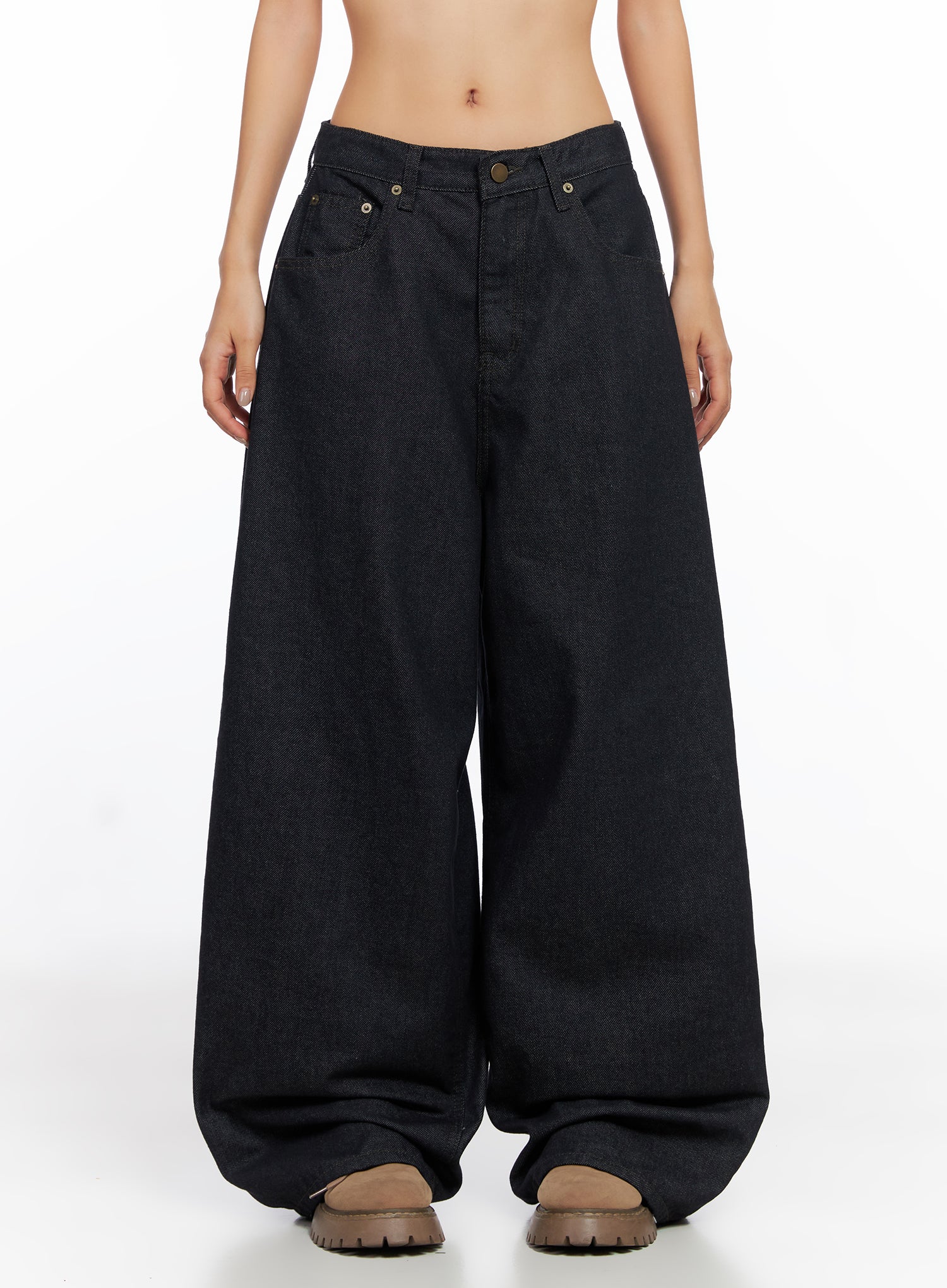 LEWKIN Miller Balloon Baggy Jeans CO515 in dark blue, front full-length on model, extreme wide-leg balloon silhouette, low rise, cotton denim, worn with chunky beige boots.