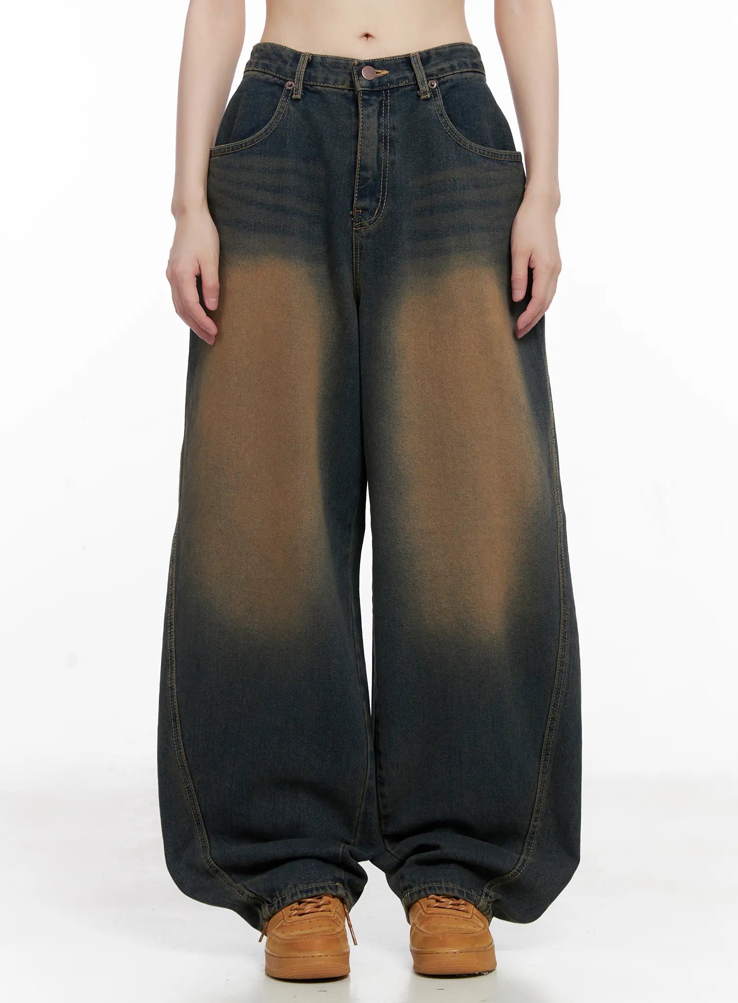 LEWKIN Jaycee Vintage Wash Baggy Jeans CG519 in dark blue, front view on model, wide-fit cotton denim with brown vintage wash fading, long length, paired with tan sneakers.