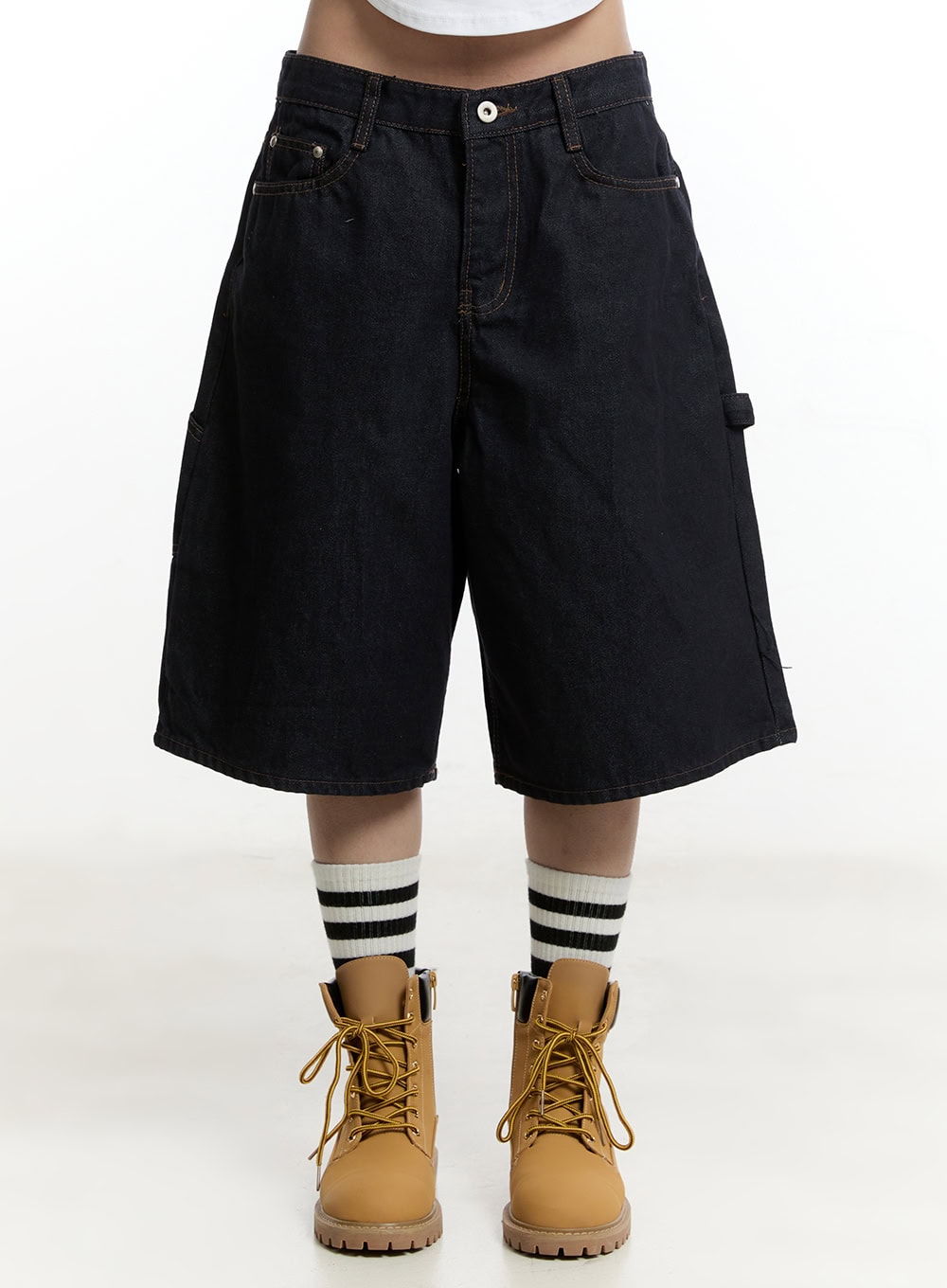 LEWKIN Carpenter Denim Wide-Leg Jorts CY501 in dark blue, front waist-down shot on model, wide-fit midi cotton denim with contrast stitching, styled with striped socks and tan boots.