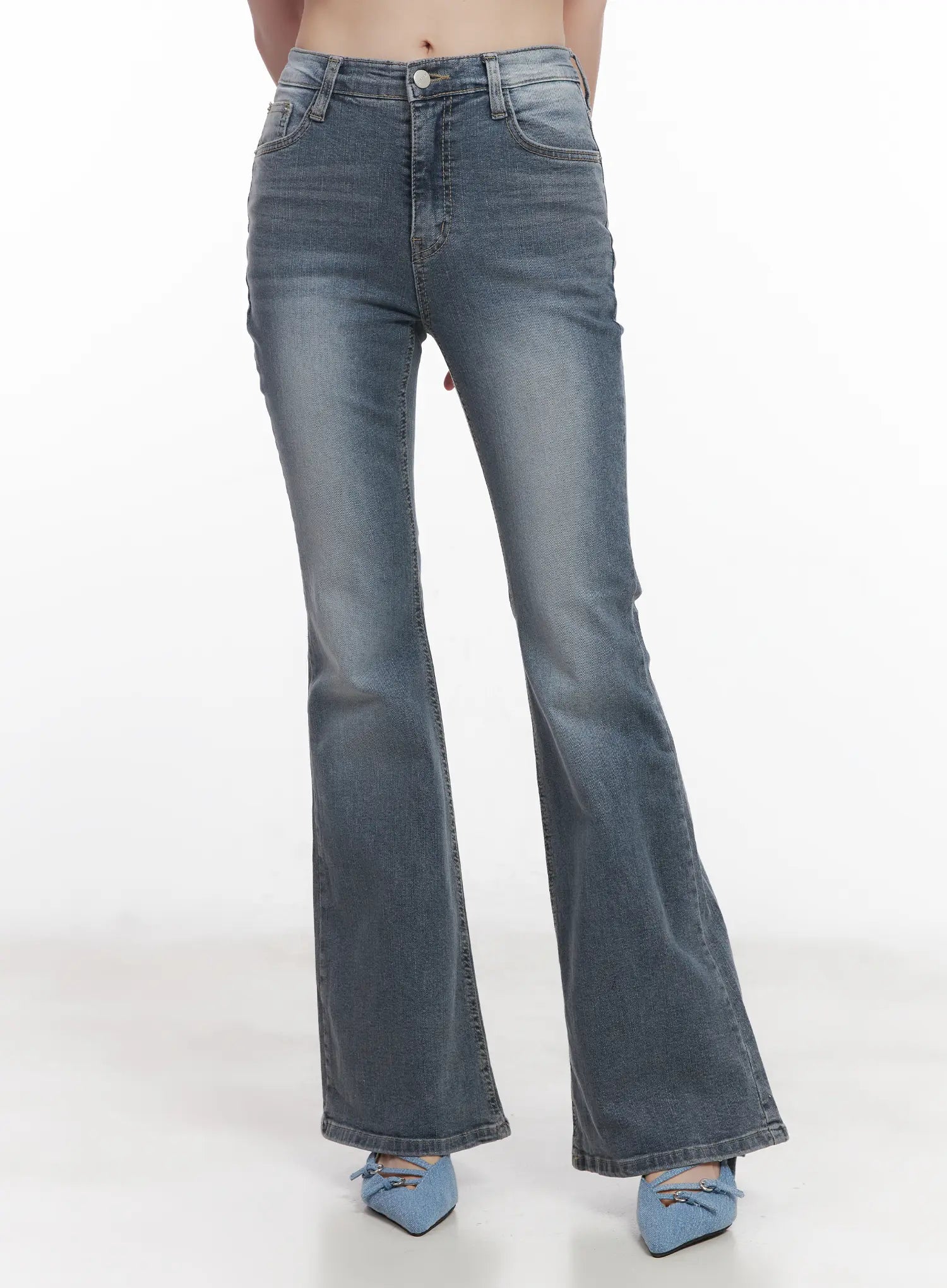 LEWKIN Soyeon Flared Jeans with Hip Pads CU520 in dark gray, front product shot on model, washed slim-fit bootcut denim with flared hem, paired with blue denim mules.