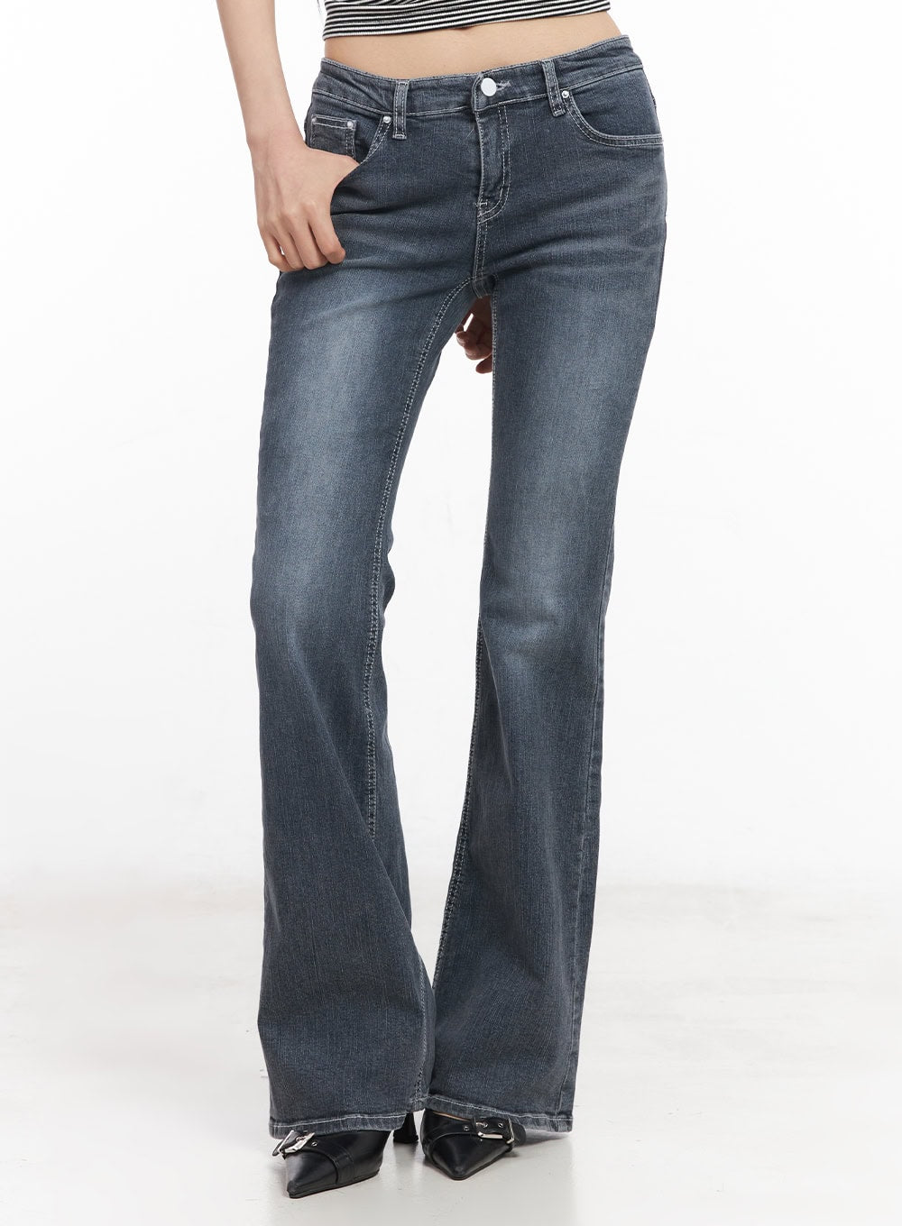 LEWKIN Nadeline Slim Bootcut Jeans CY528 in dark gray, front close-up on model, slim fit washed denim with low rise waistband and bootcut flare leg, paired with black heeled mules.