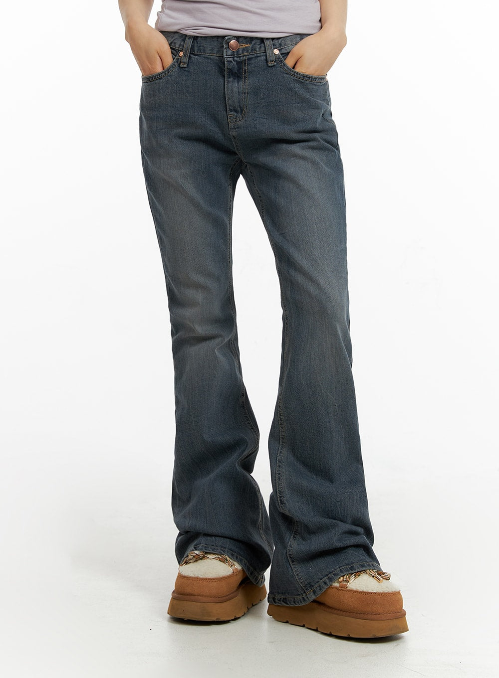 LEWKIN Slim Washed Flared Jeans CF416 in mid-blue, front view on model, slim fit bootcut silhouette with washed denim, flared hem pooling over platform boots.