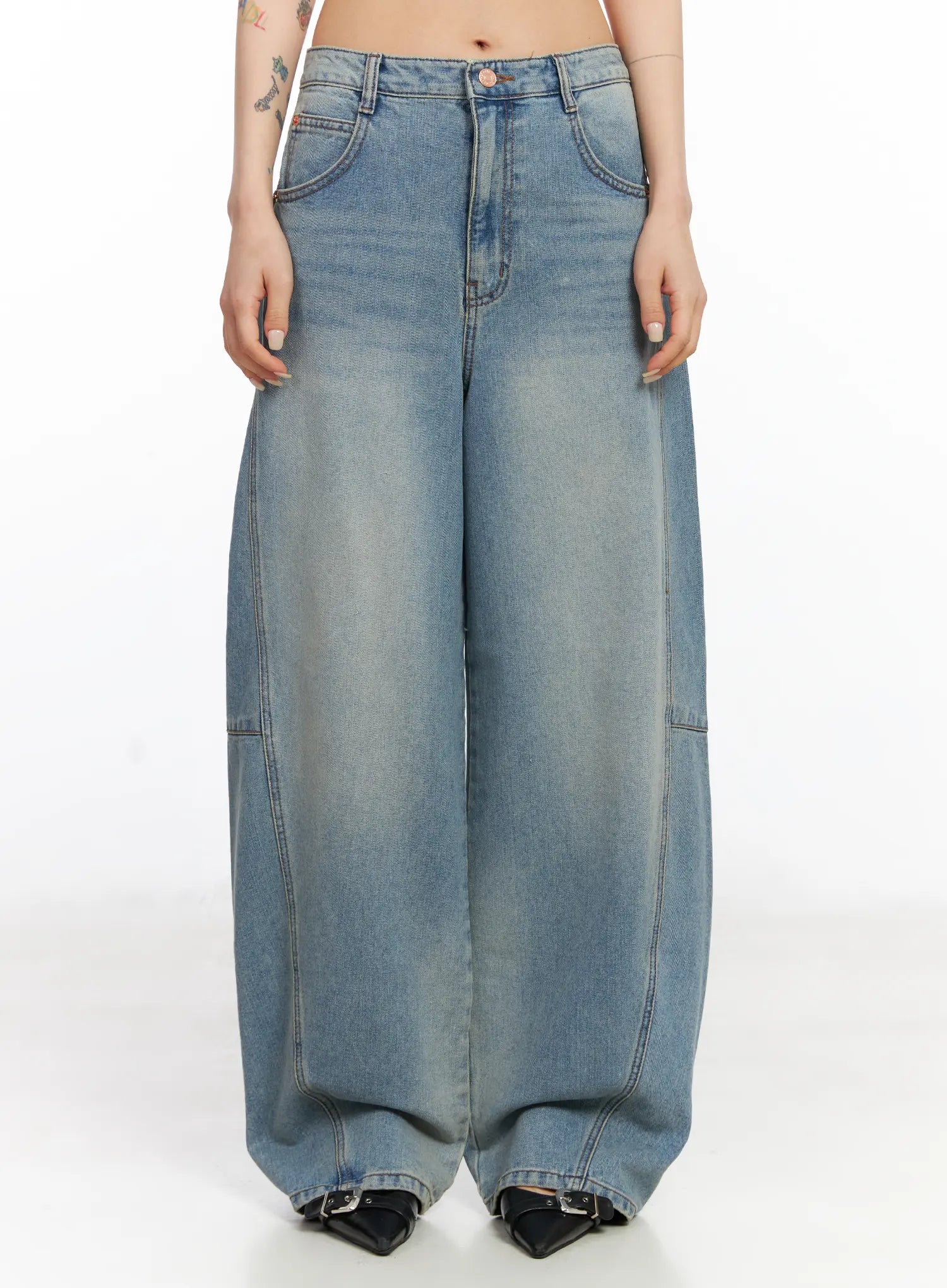LEWKIN Frey Washed Wide-Leg Jeans CJ523 in light blue, front view on model size 1XL, high-rise cotton denim with panel seams, wide-leg silhouette, worn with black buckle flats.