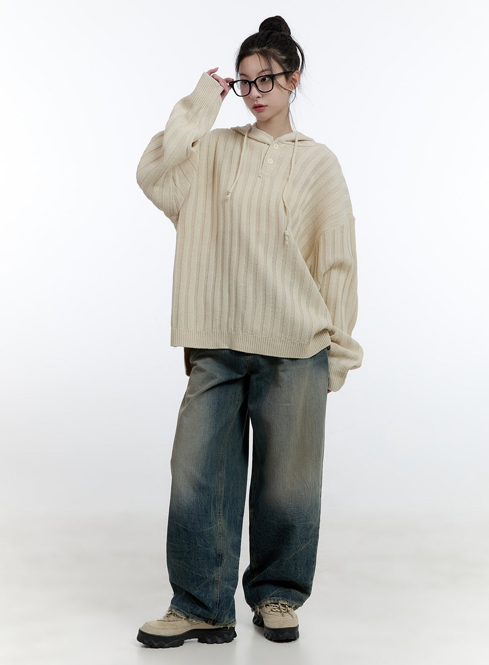 Danielle Vintage Washed Baggy Jeans CJ522 in blue, full-body front on model, wide baggy fit with yellow-tinted vintage wash, styled with cream ribbed hooded knit and chunky sneakers.