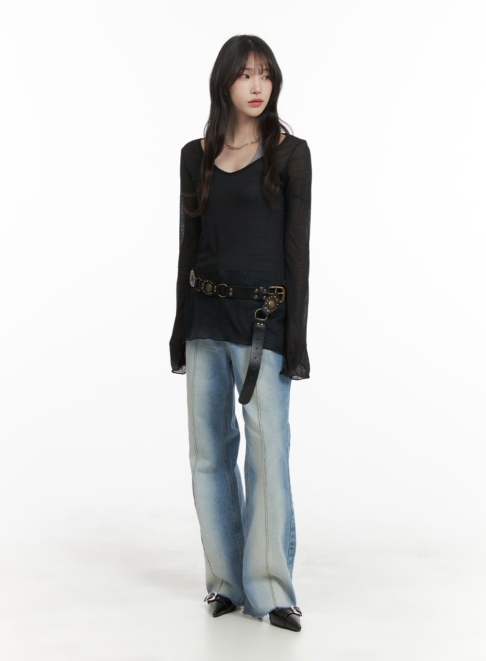 Denim Stitching Wide Fit Straight Jeans CA402 in blue, full-body shot on model, wide fit washed denim with front stitching, styled with sheer black top and layered leather belt.