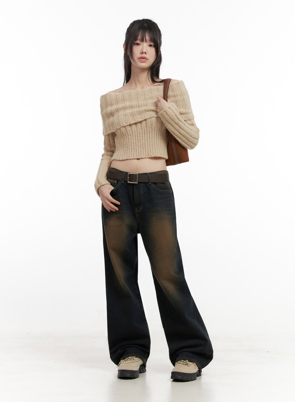 Alexia Washed Denim Wide-Leg Jeans ID402 in dark blue, full-length front shot on model, wide-fit washed denim with amber fade, styled with off-shoulder crop knit, belt, and tote bag.
