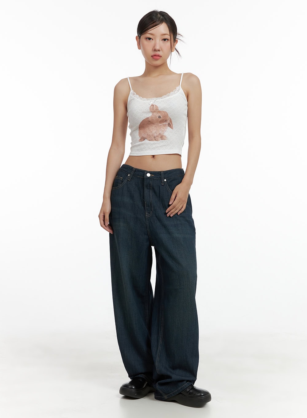 Dark Wash Wide Jeans CU305 in dark blue, full-length front shot on model, relaxed wide fit with floor-grazing hem, styled with white lace rabbit graphic crop cami top and black loafers.