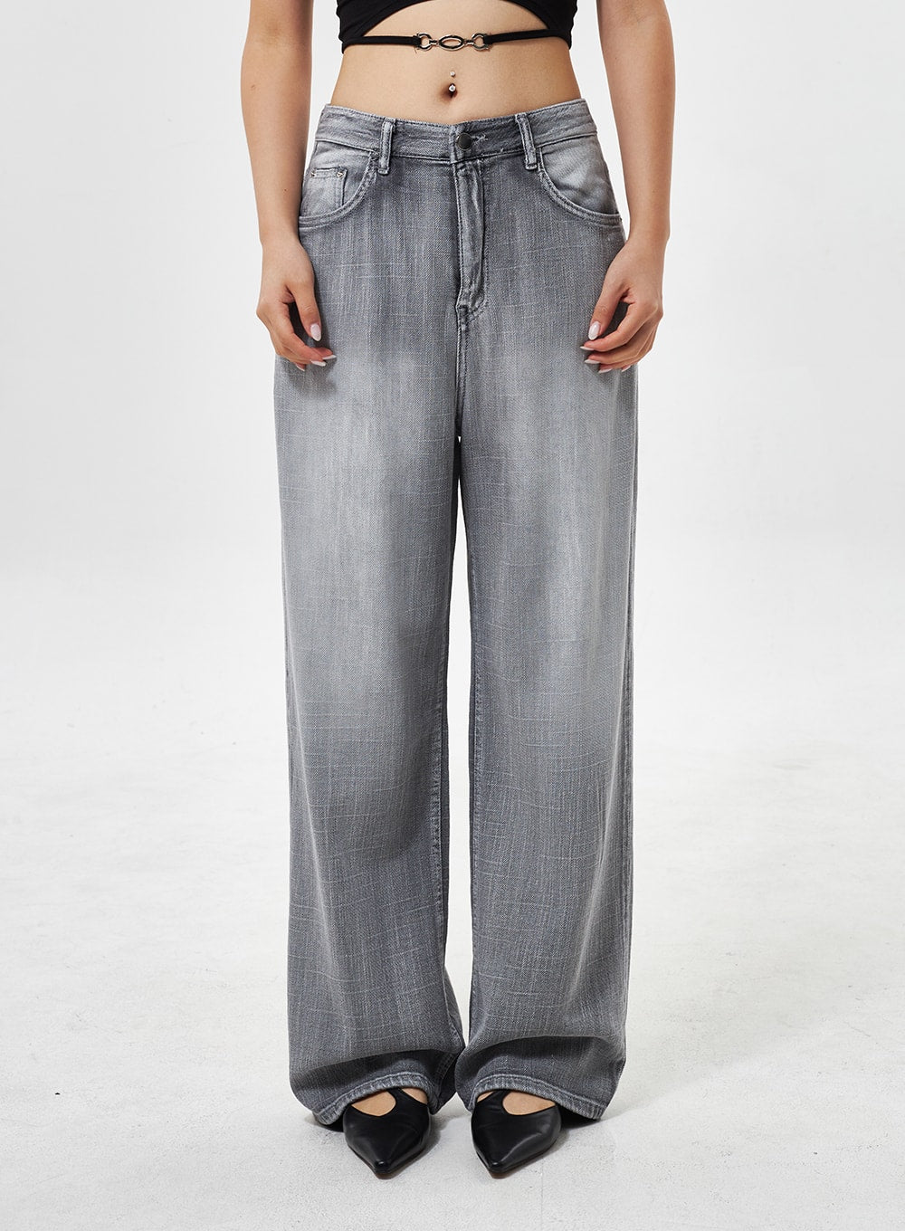 Mid-Rise Wide Leg Jeans CY330 in grey, front close-up on model, mid-rise waistband with button fly, faded wide-leg denim silhouette to floor.
