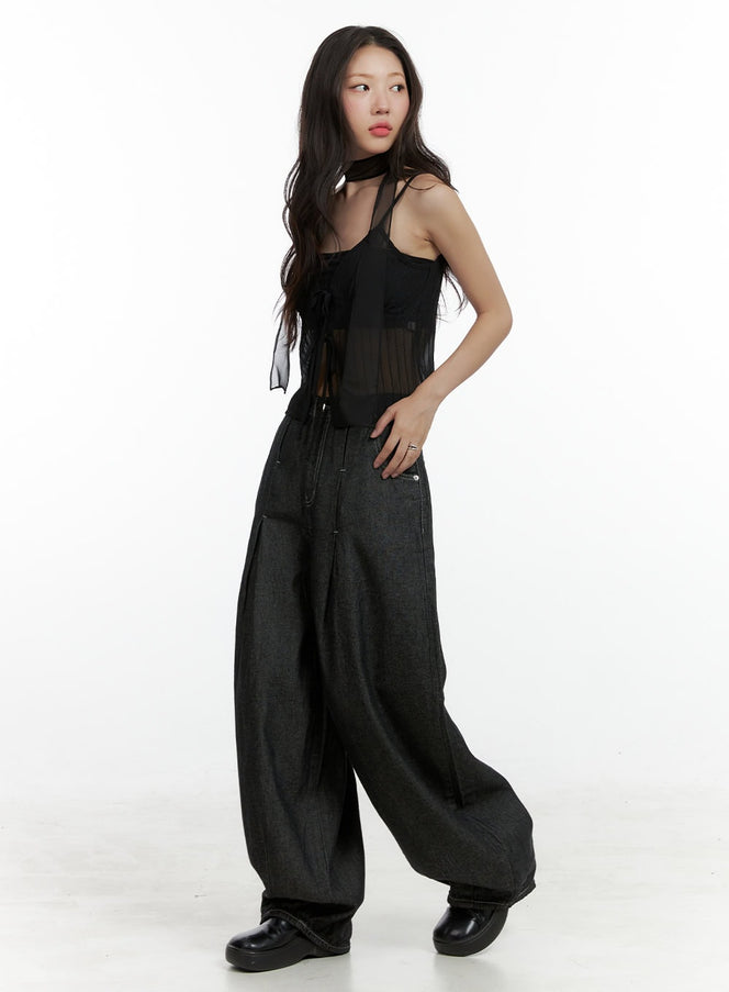 Mesh Slit Strap Tank Top with Scarf Set CL410 in black, three-quarter side view on model, sheer striped mesh crop top with scarf choker strap, styled with oversized dark baggy denim and black platform shoes.