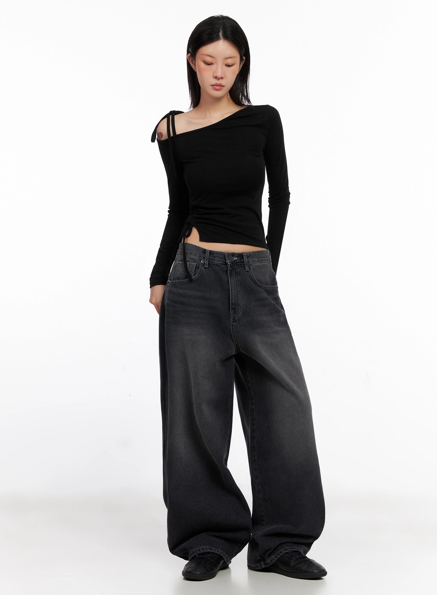 Casual Wide-Leg Baggy Jeans IS515 in Gray, full-length front on model, oversized baggy fit with washed denim, styled with black asymmetric crop top and black flats.