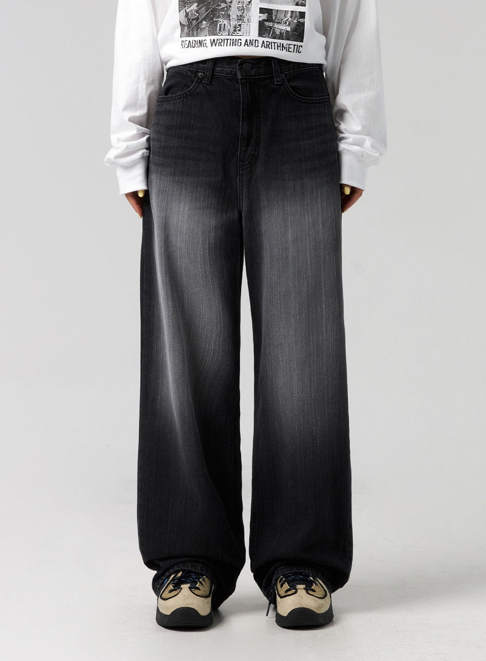 Washed Wide-Leg Jeans CG327 in black, front close-up on model from waist to hem, high-rise waistband, faded washed denim with wide leg silhouette, styled with white graphic tee.