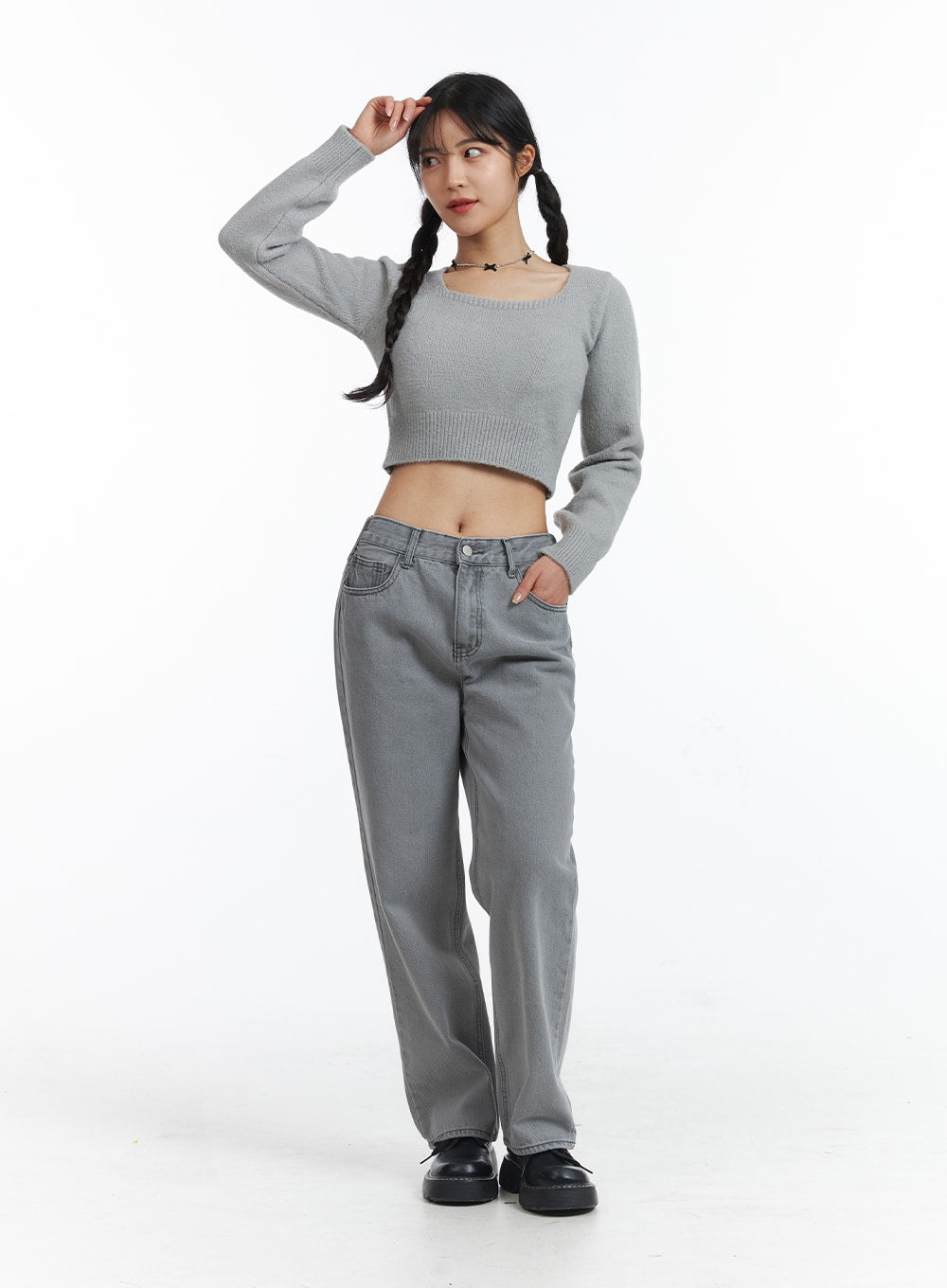 Low-Rise Straight Leg Jeans OJ426 in gray, full-body front view on model, wide-fit low-rise washed denim, styled with a gray crop sweater and black platform shoes.