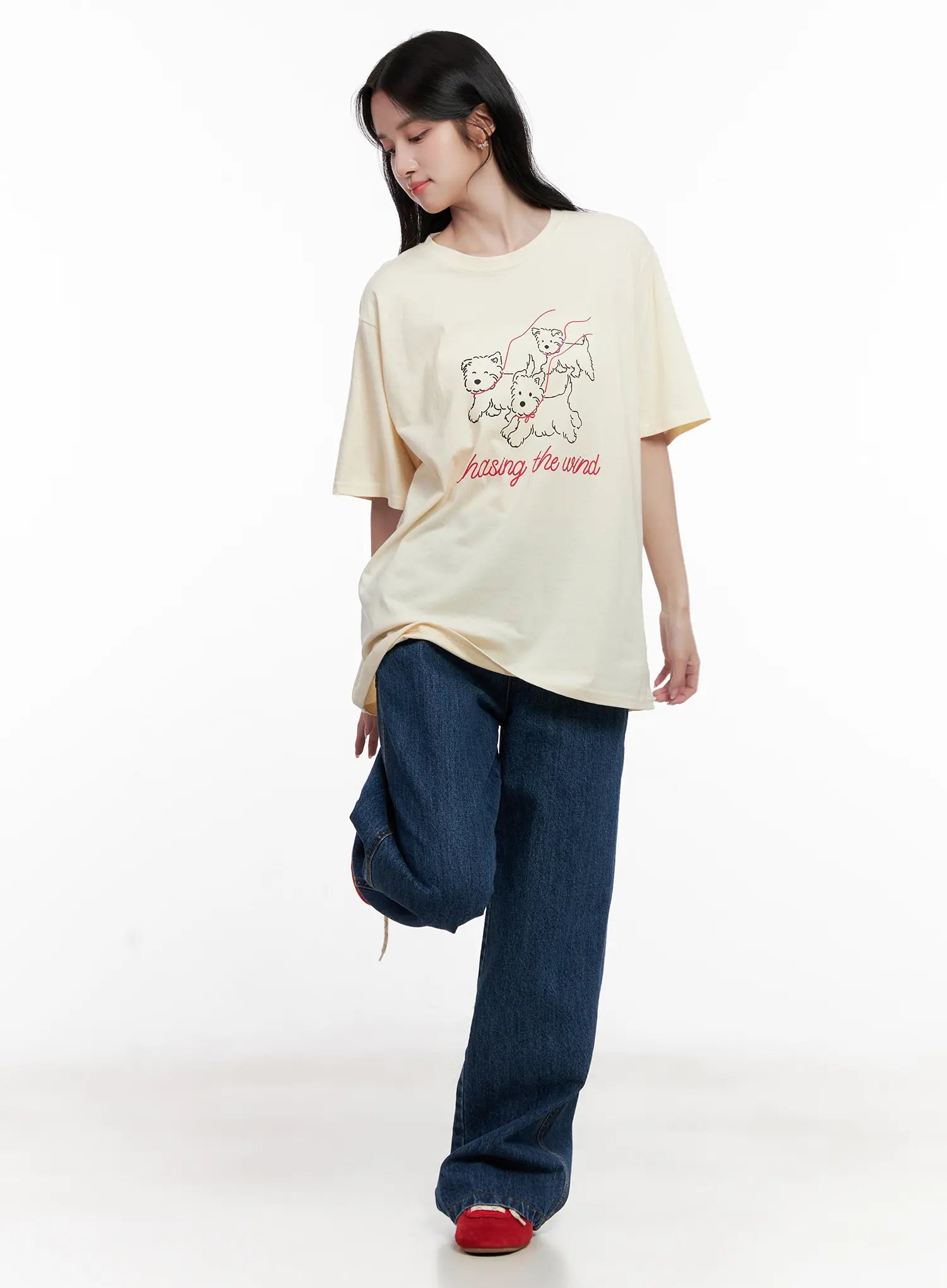 Ahyeon Classic Relaxed-Fit Denim Jeans CL515 in dark blue, full-body front worn by model, wide-leg silhouette, styled with cream graphic tee and red flats.