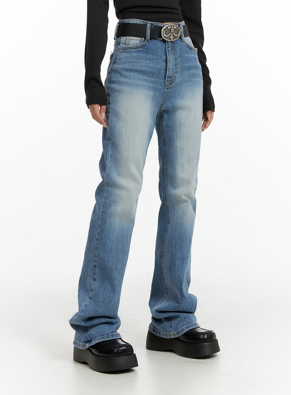 Washed Slim Fit Bootcut Jeans CF415 in light blue, front side close-up on model, washed denim with slim thigh and bootcut hem, paired with black belt and platform loafers.