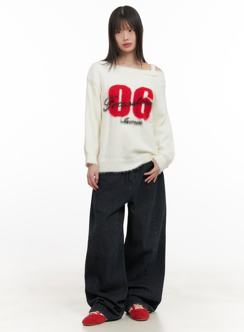Comfortable Striped Wide-Leg Pants CD425 in dark blue, full-body front shot on model, baggy wide-leg silhouette with vertical stripes, styled with white graphic off-shoulder knit and red sneakers.