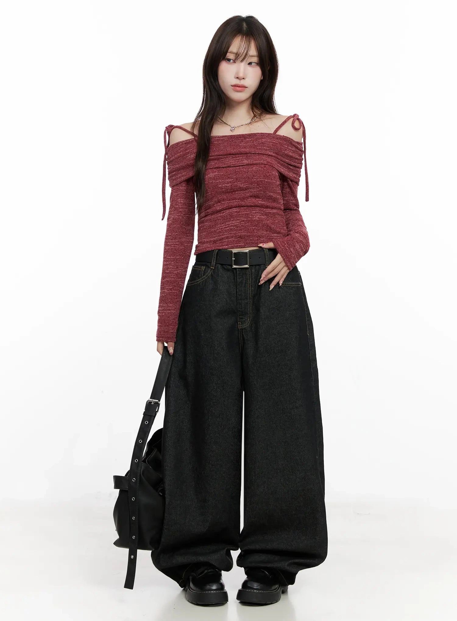 Halo Wide Leg Stitch Detail Jeans IN514 in black, full-body front on model, ultra-wide cotton denim with gold stitch detail, styled with red off-shoulder top and black belt bag.