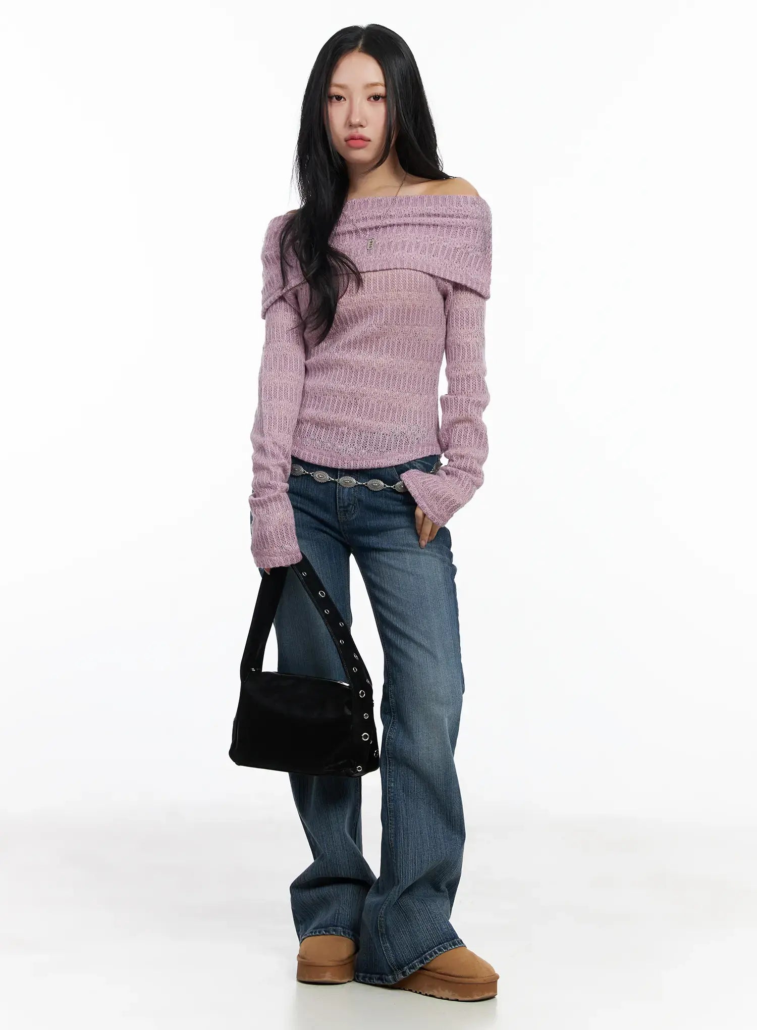Astrid Low Rise Flared Bootcut Jeans CJ514 in blue, full-length front styling shot on model, low-rise waist with concho belt, paired with pink off-shoulder knit and black shoulder bag.