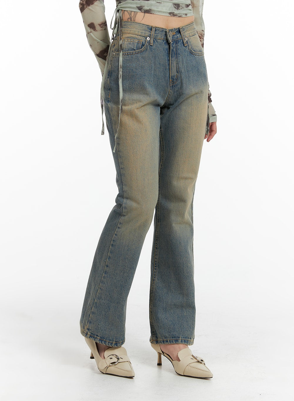 Washed Flared Jeans IF426 in blue, front three-quarter close-up on model, washed denim with subtle fading and slight flare hem, paired with mesh long-sleeve top.