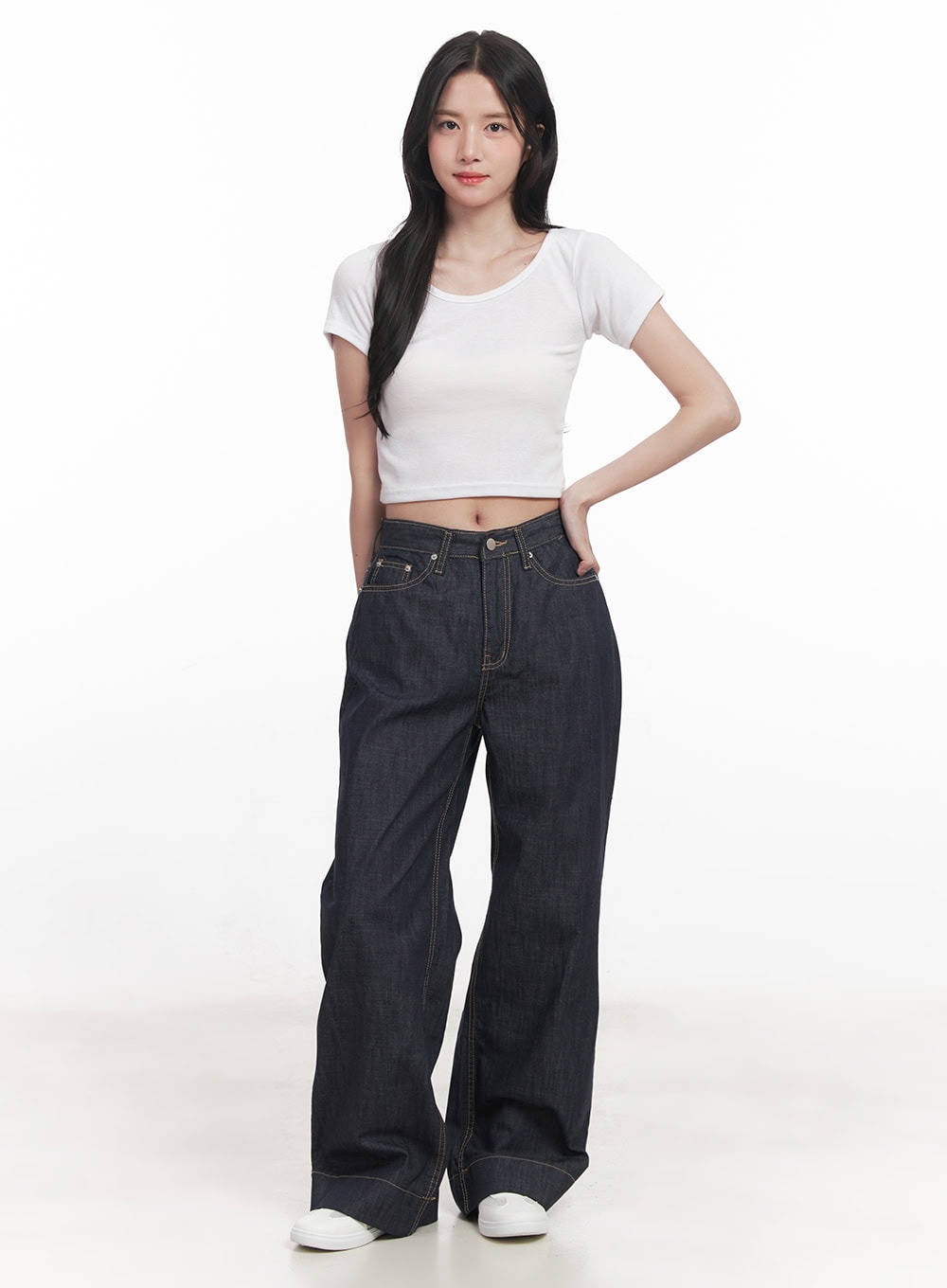 Seline Non-Fade Wide-Leg Jeans CA510 in dark blue, full-body front view on model, high-waist wide-leg denim with gold topstitching, styled with white crop tee and white sneakers.