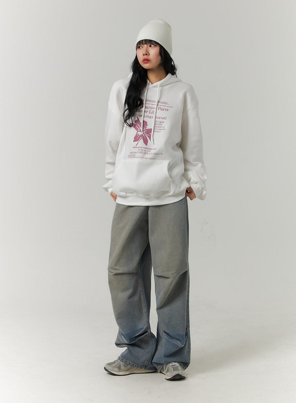 Pintuck Washed Denim Wide-Leg Jeans CJ418 in blue, front full-body shot on model standing straight, washed wide-leg silhouette with pintuck folds, paired with oversized white hoodie and sneakers.